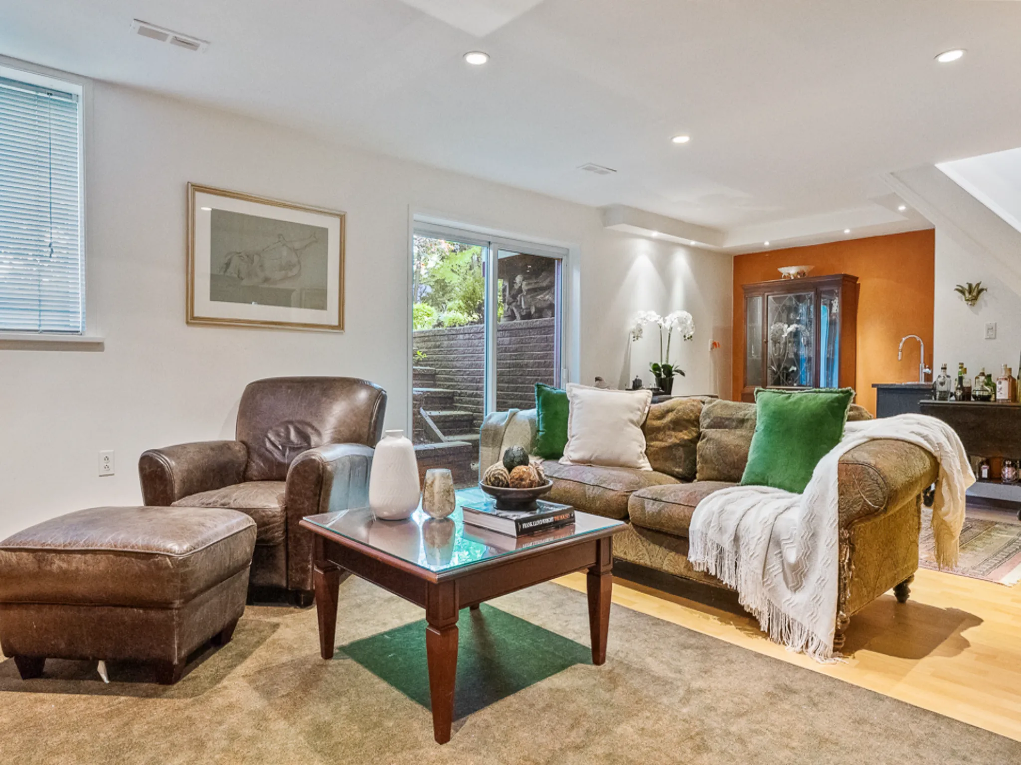 lower level with glass doors and walkup to yard