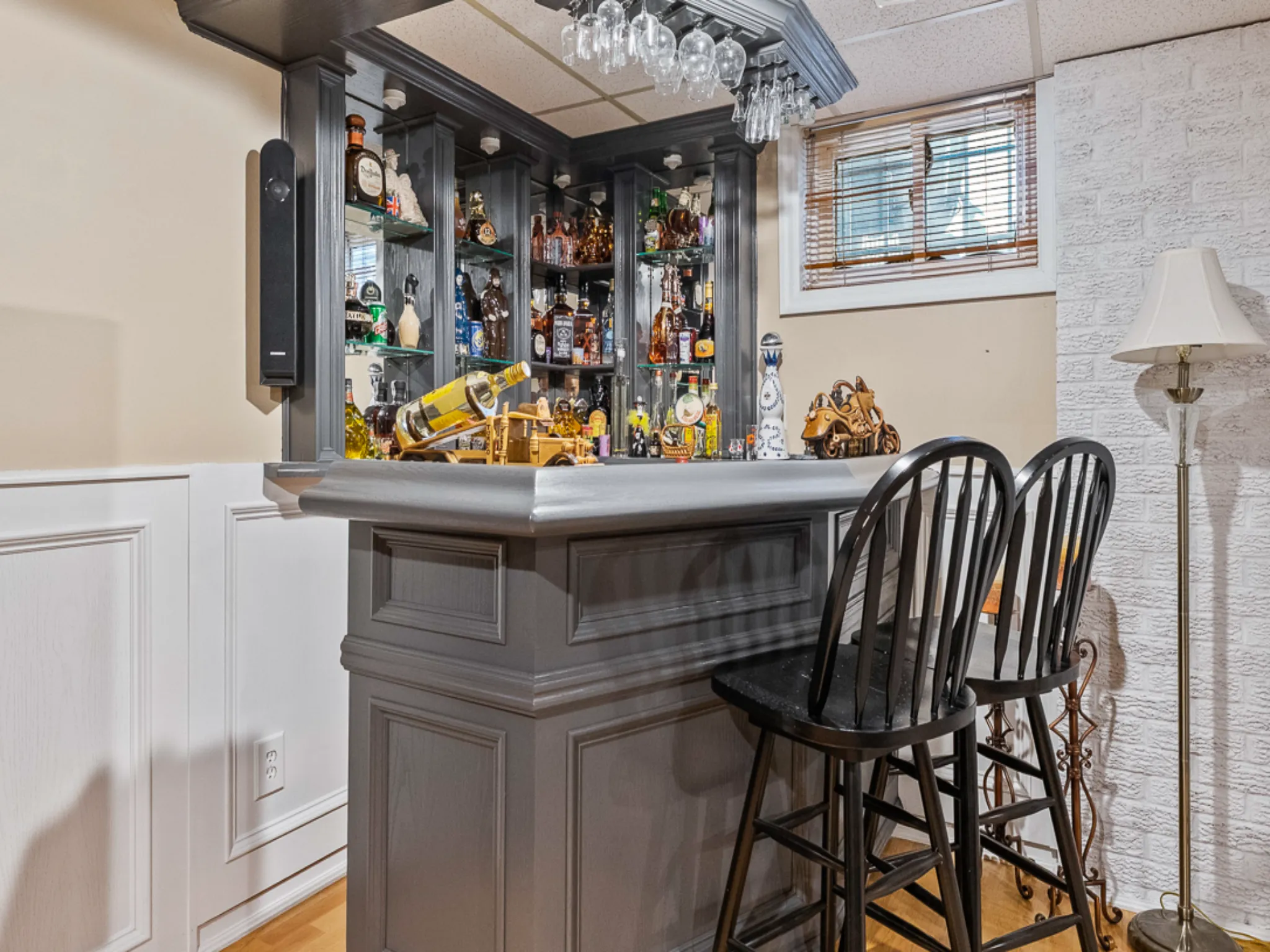 bar area in the basement with seating for two