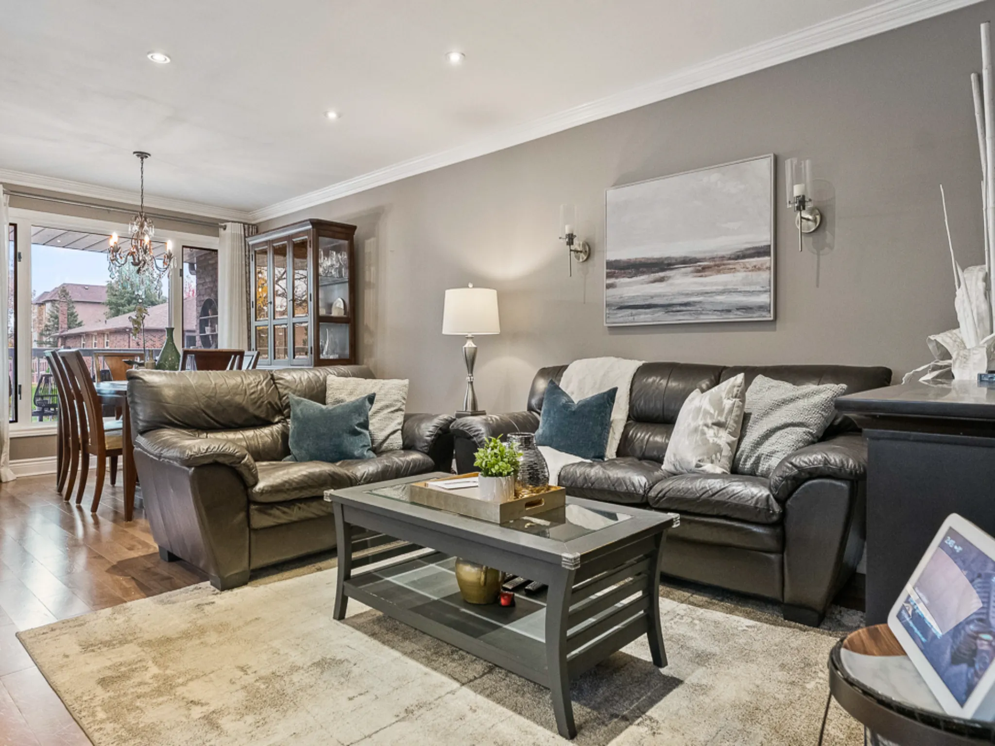 living room with couches and coffee table, art on the wall