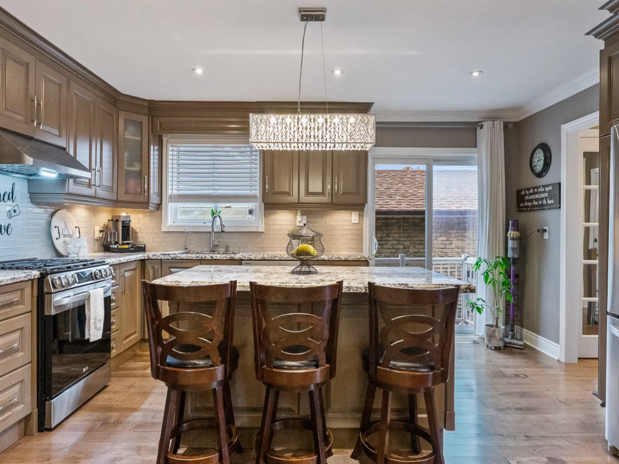 kitchen with large island and seating for three people
