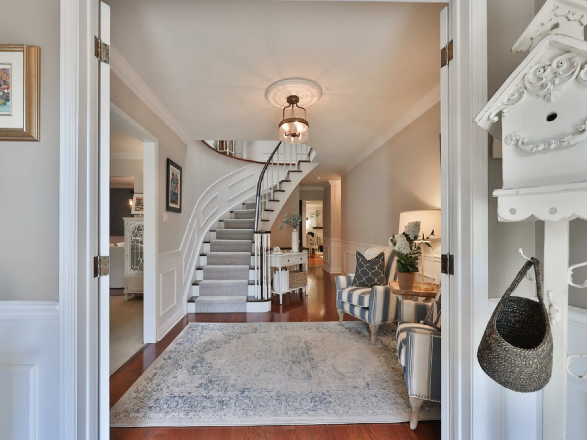 front foyer of the home with grand staircase