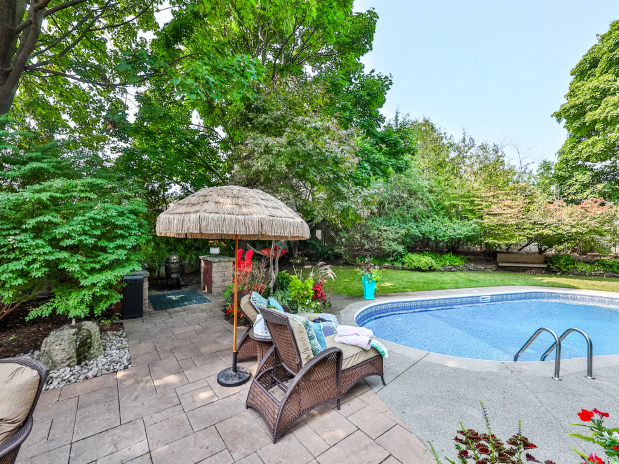 gorgeous backyard with pool and patios