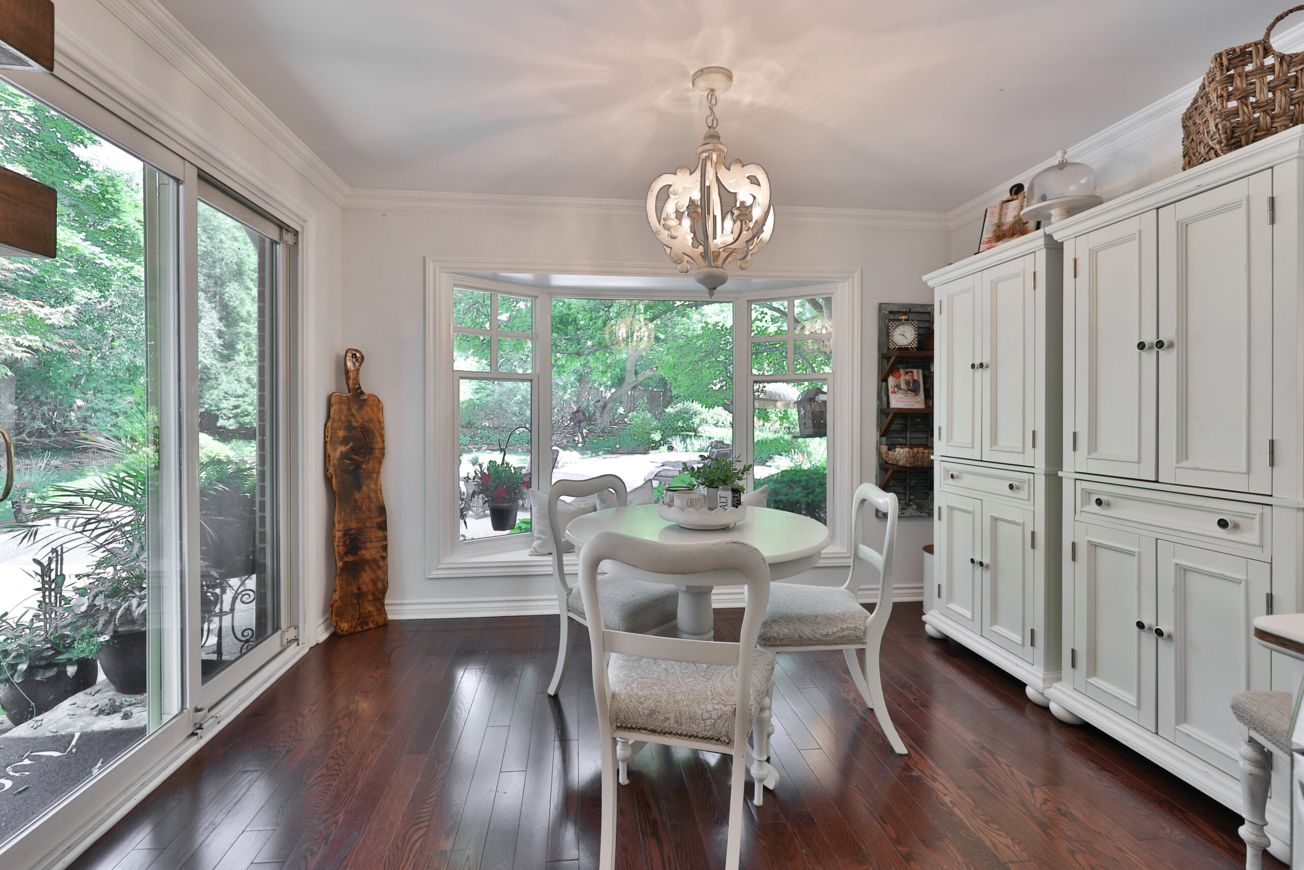 breakfast area with windows and cabinetry