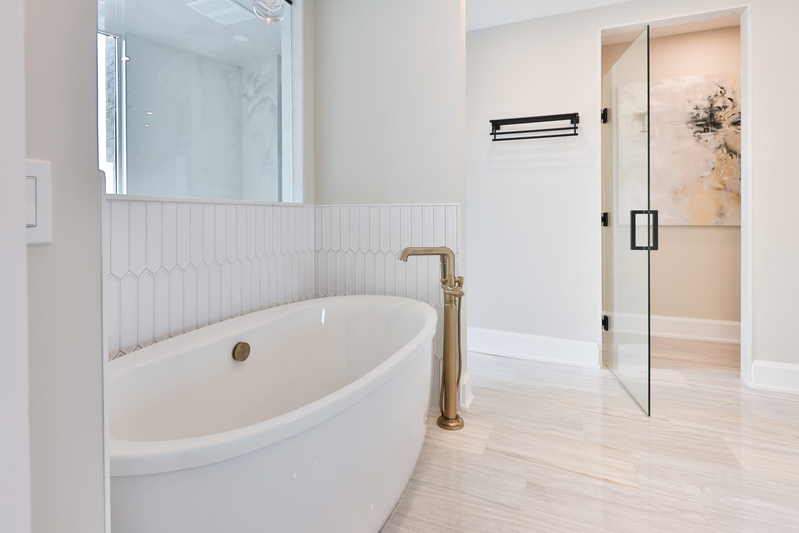 principal ensuite with walk in shower and soaker tub