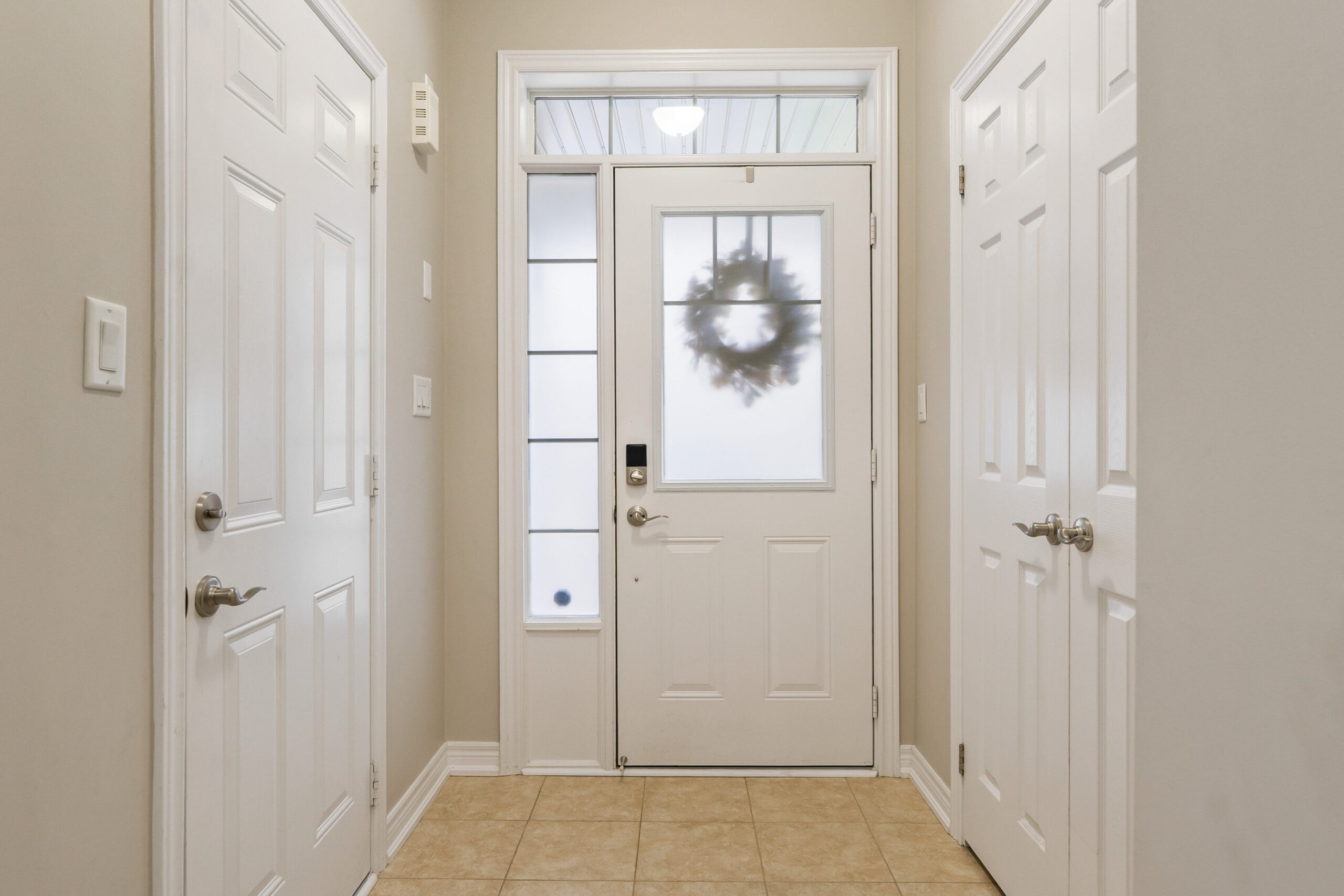 front foyer with access to garage and front hall closet