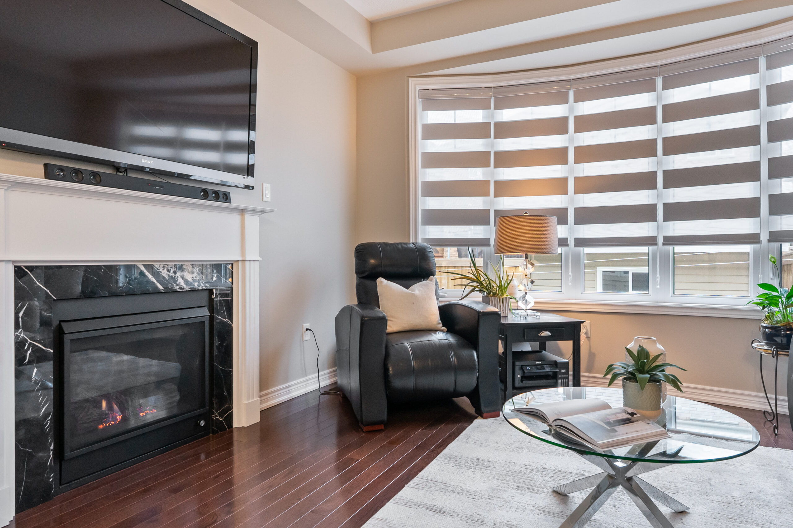 family room with large bay window and gas fireplace