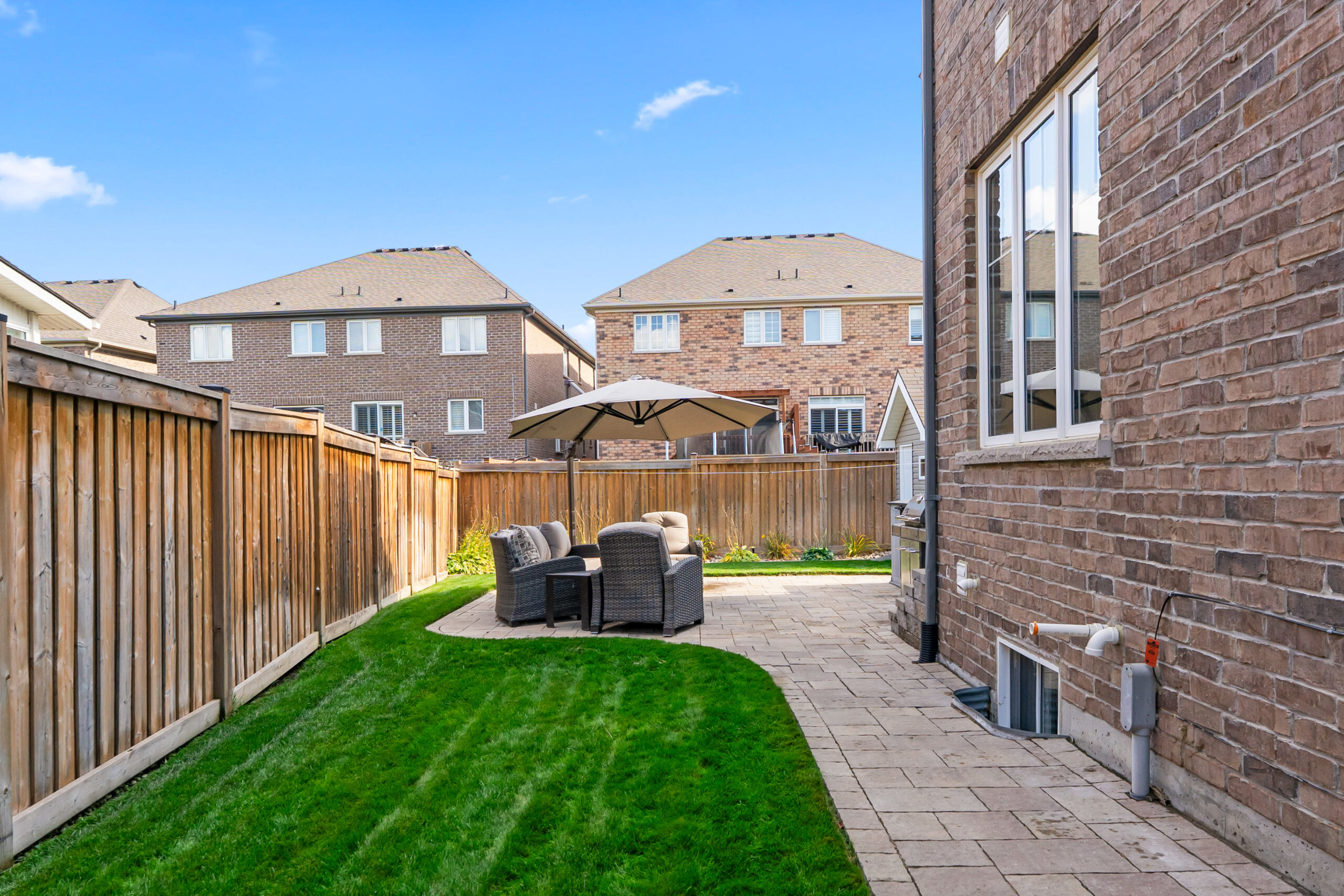 side yard of house. cedar fence surrounding the property