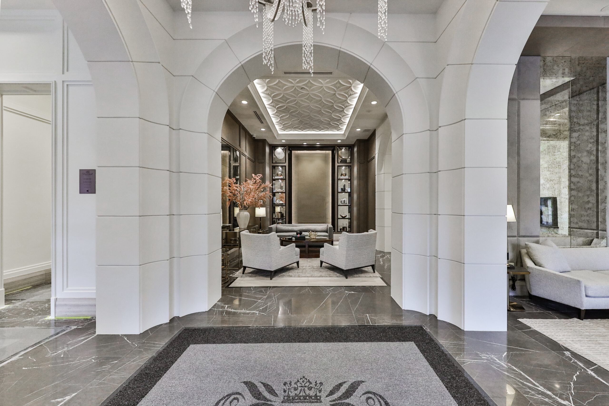 foyer- lounge area with seating and a small reading area