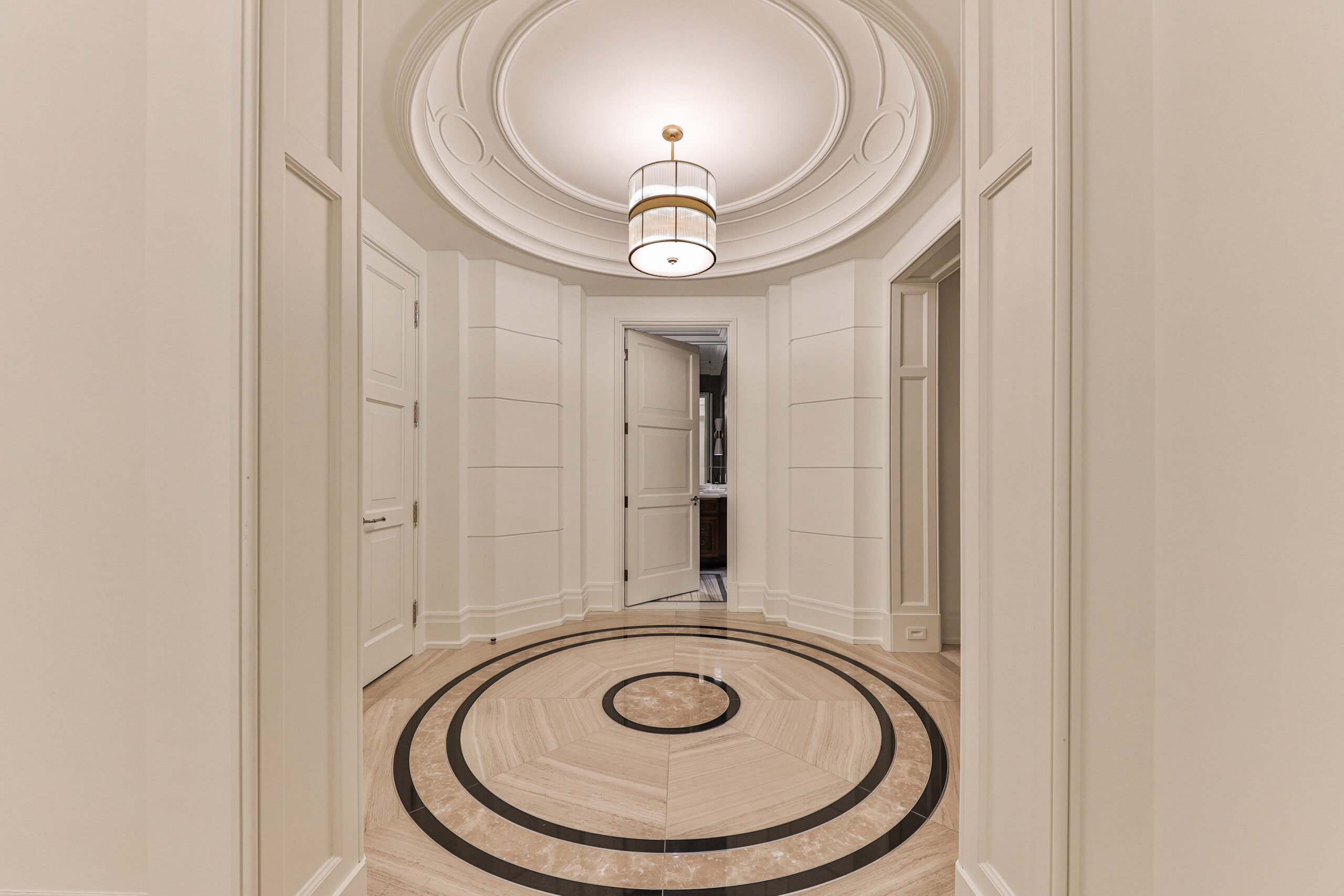 unit entrance into grand circular foyer