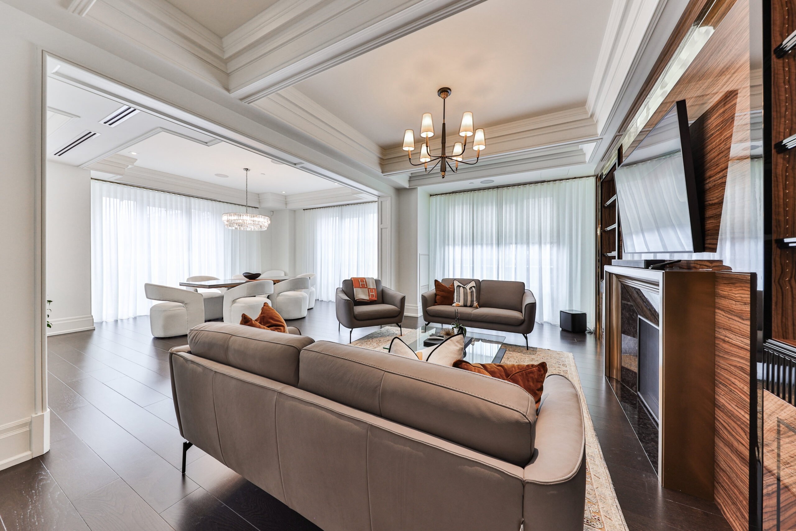 family room with built in cabinets and fire place