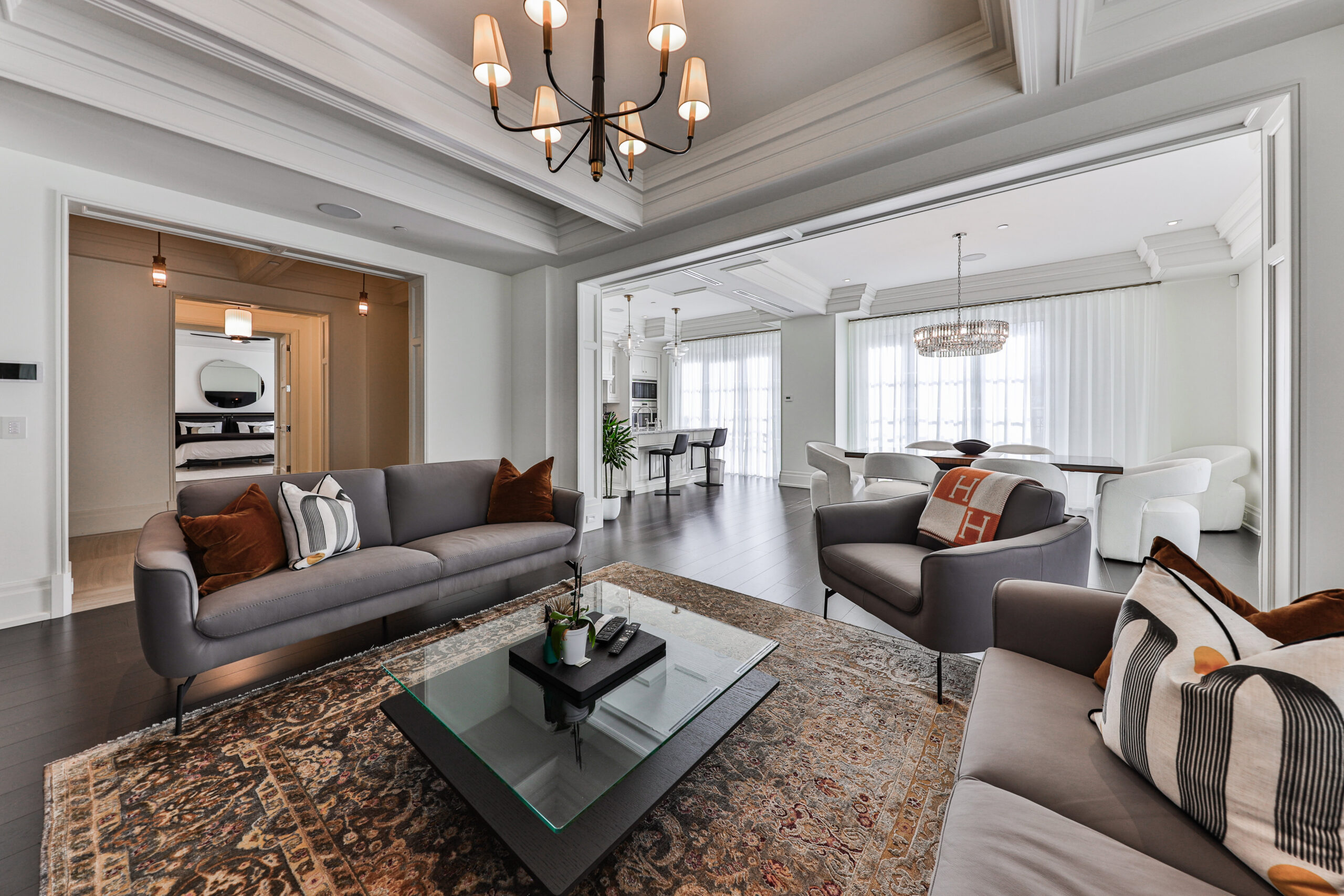 open concept unit showing dining room, family room and kitchen