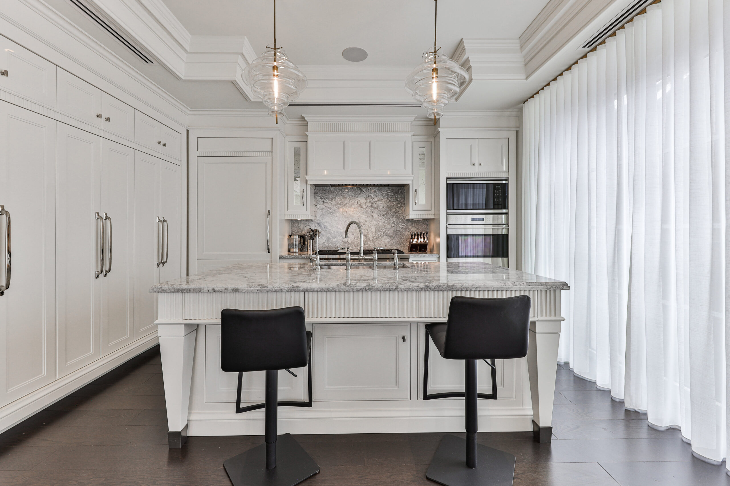 double wall oven, hidden fridge, wine fridge, pendant lighting