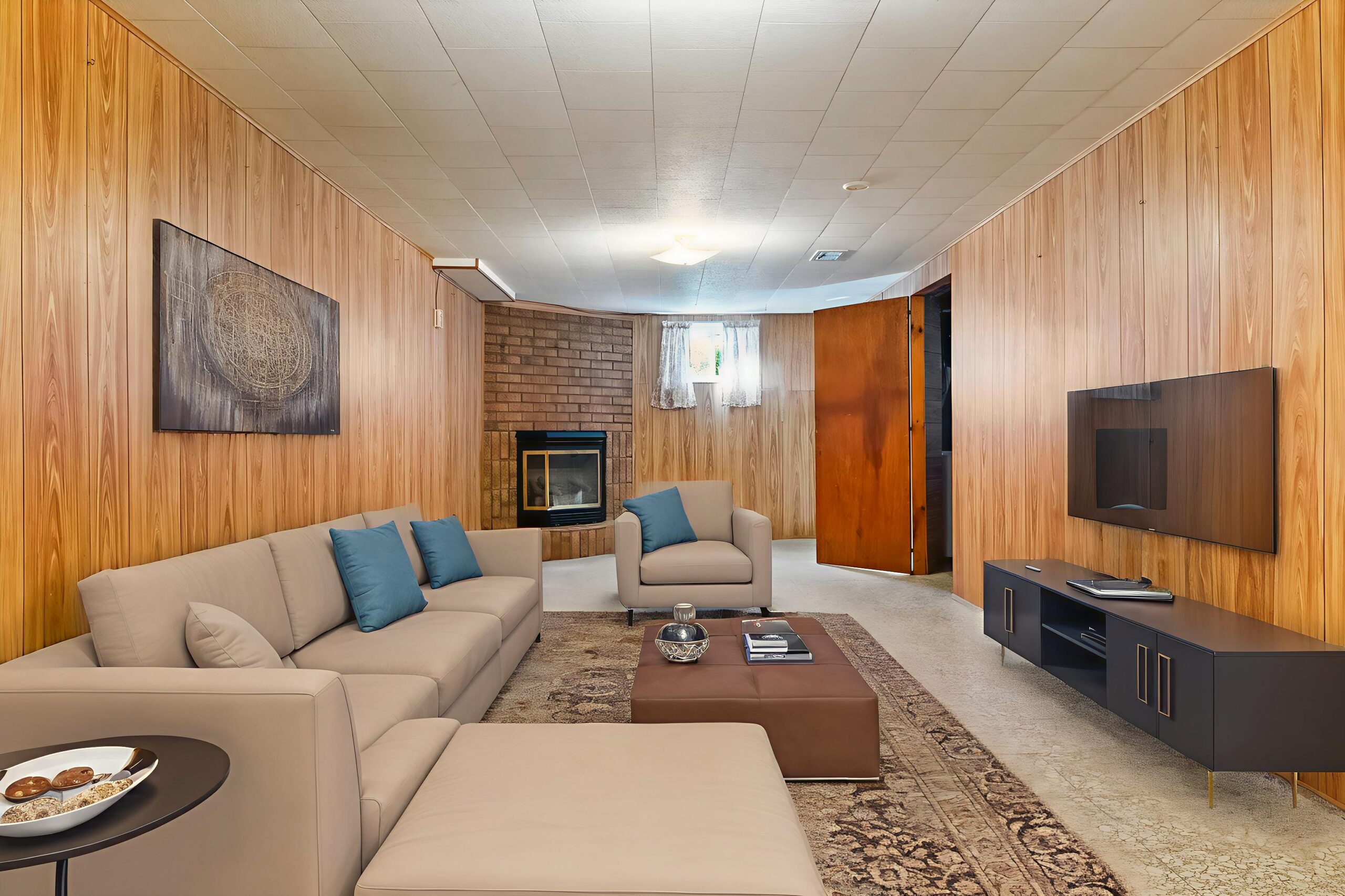 lower level recreation room with fire place