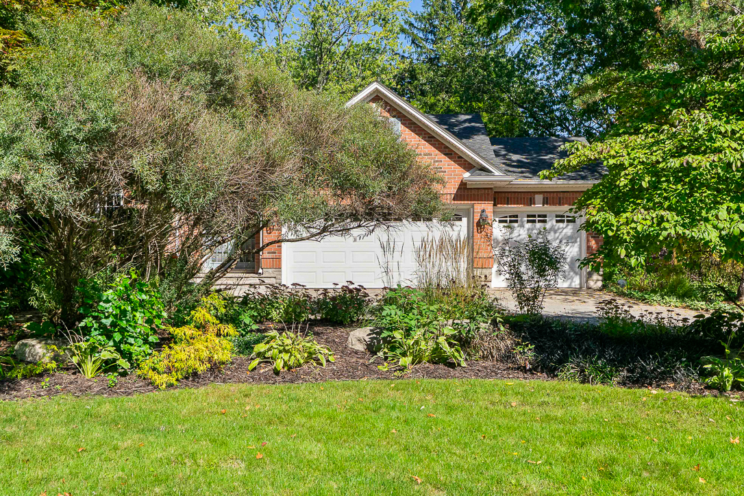 front view of house showing green gardens
