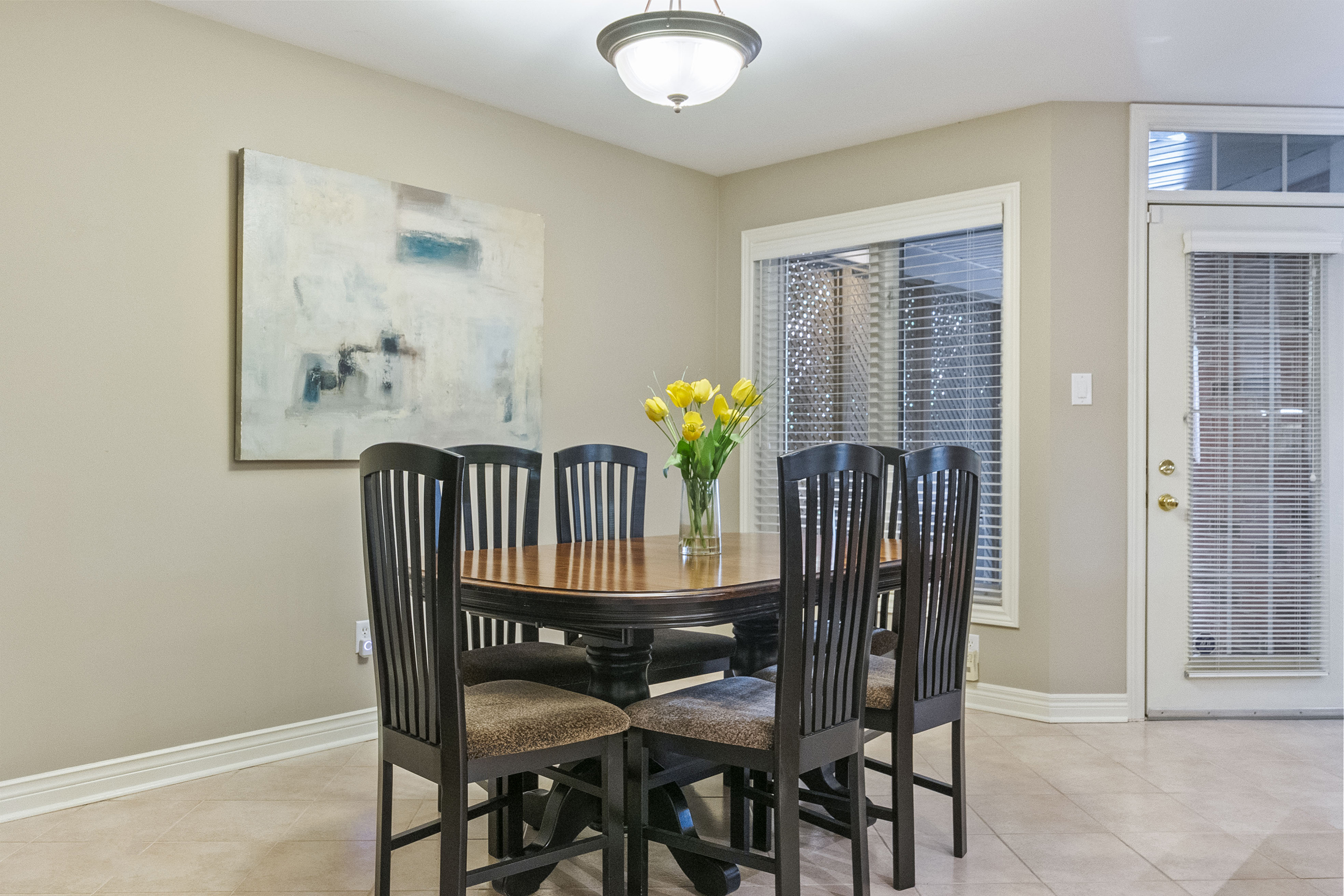 kitchen breakfast area with doorway to outside