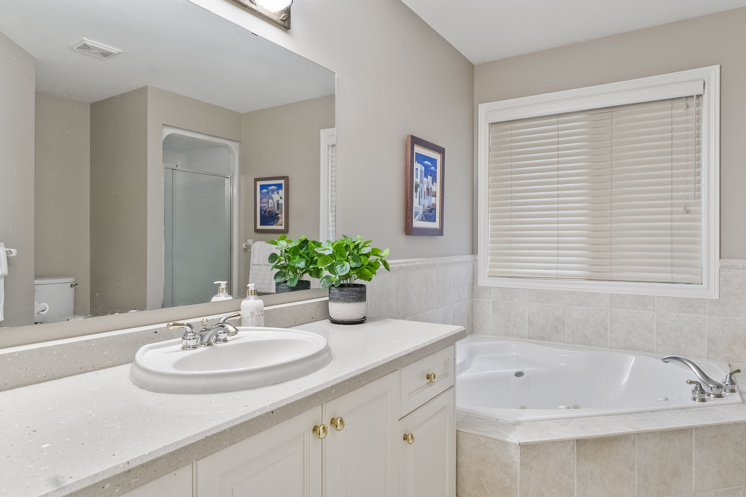 principal ensuite with large bath tub