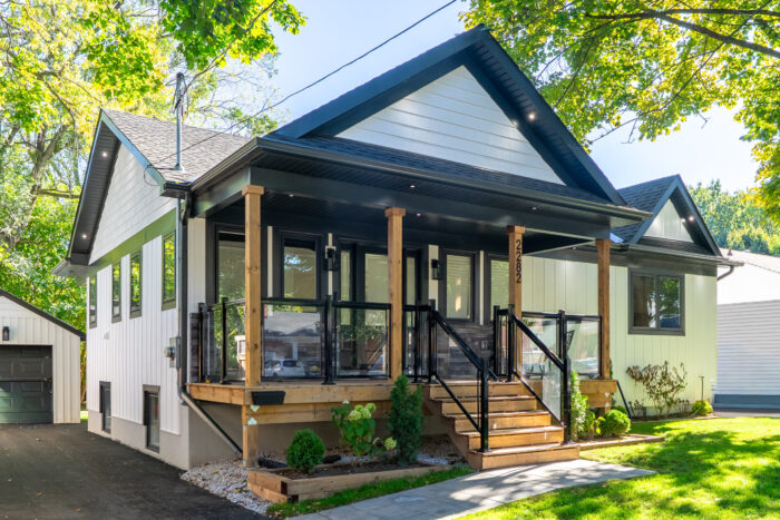 brand new consctruction- new white siding with black window trim