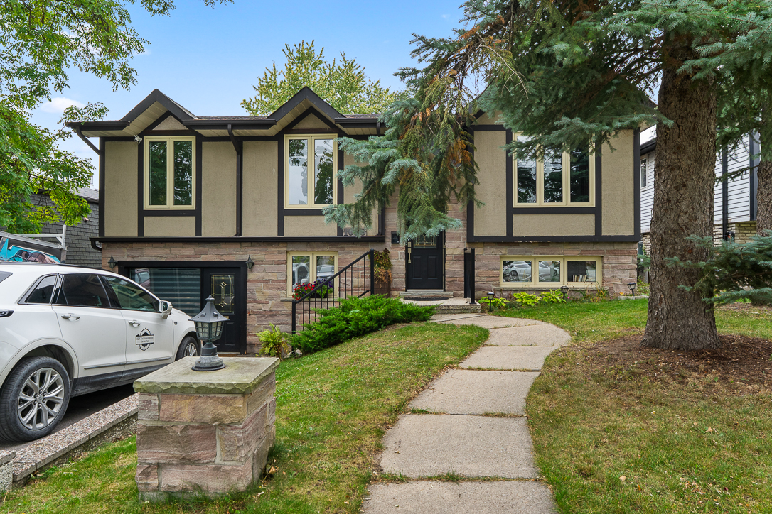 Front of house with curved walk way