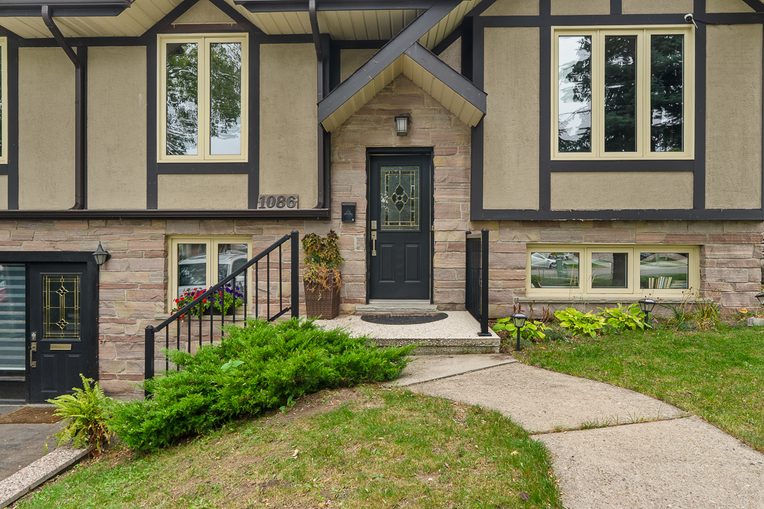 welcoming front door with window peaks