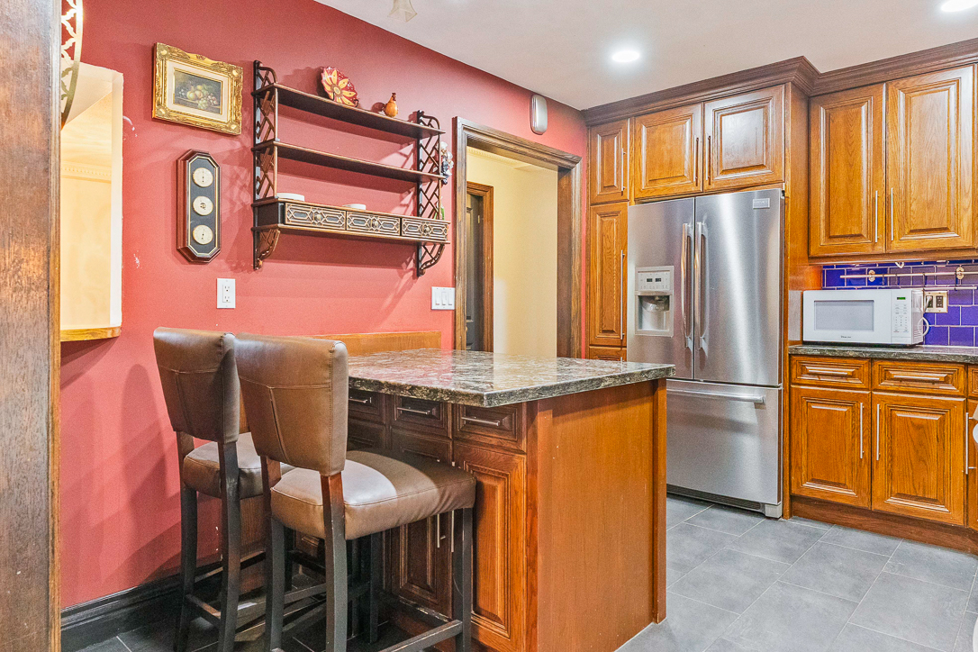 kitchen eat in area with bar stools