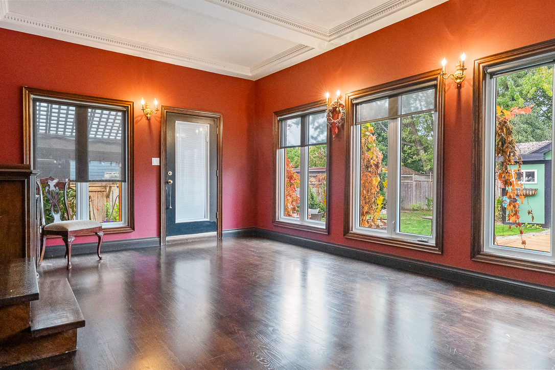 family room with plenty of natural lights coming in from the numerous windows
