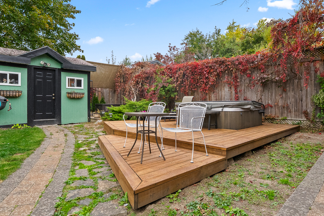 hot tub with deck for lounging