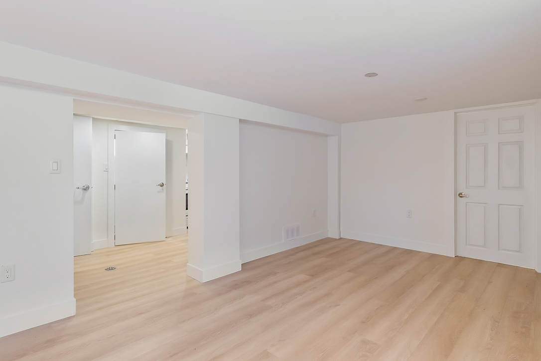 family room with light wood flooring