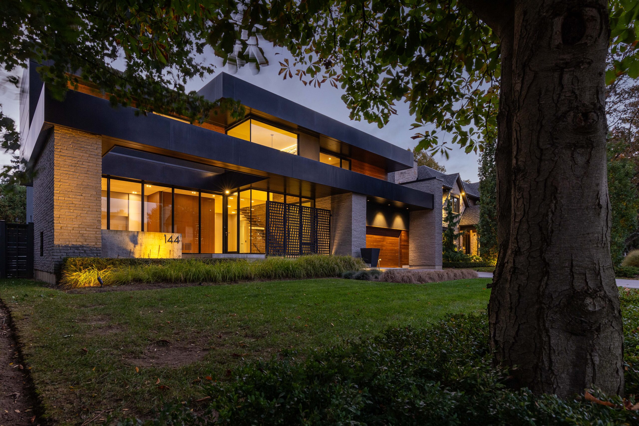 Modern front house with lots of large windows