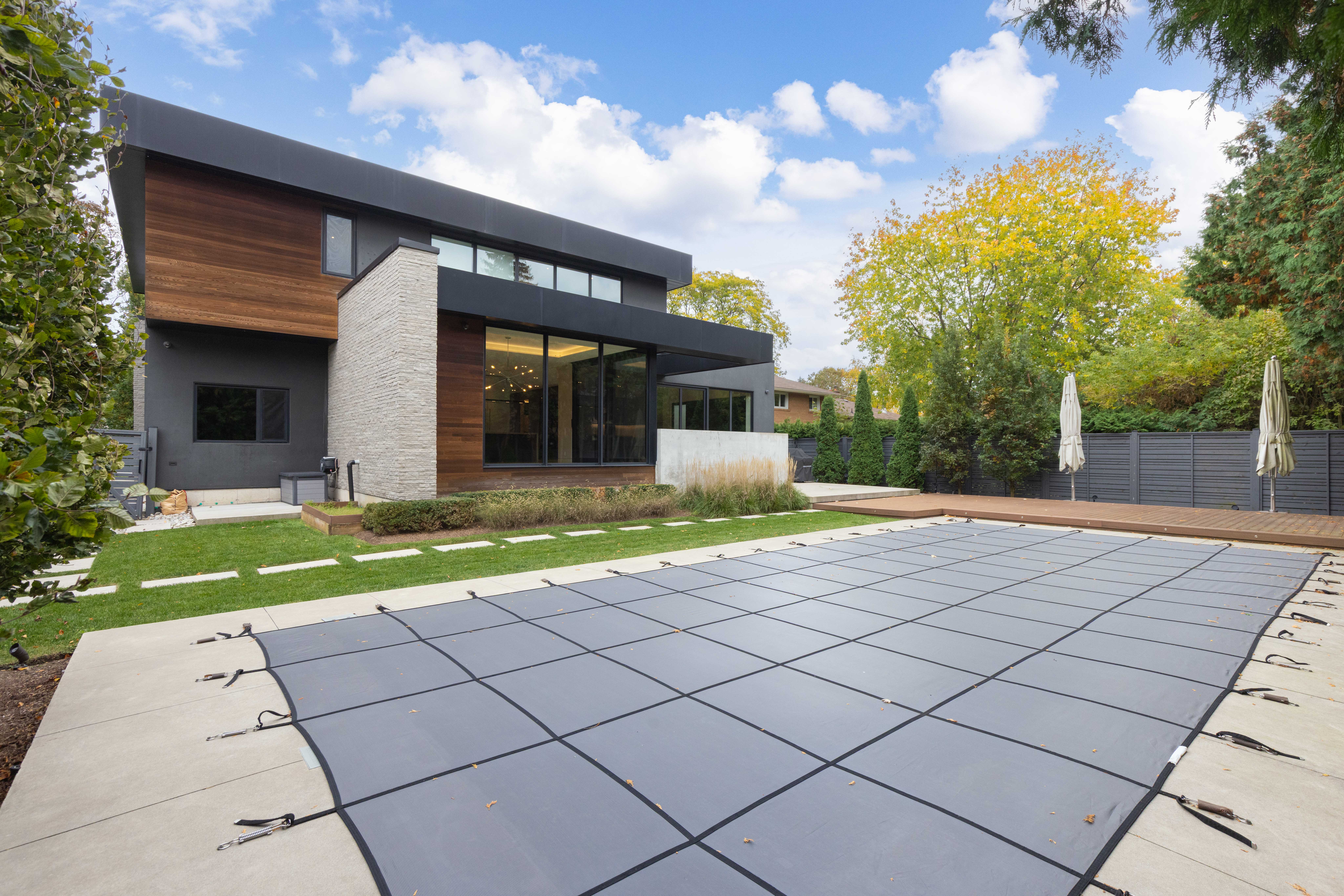 back house view showing large in ground pool