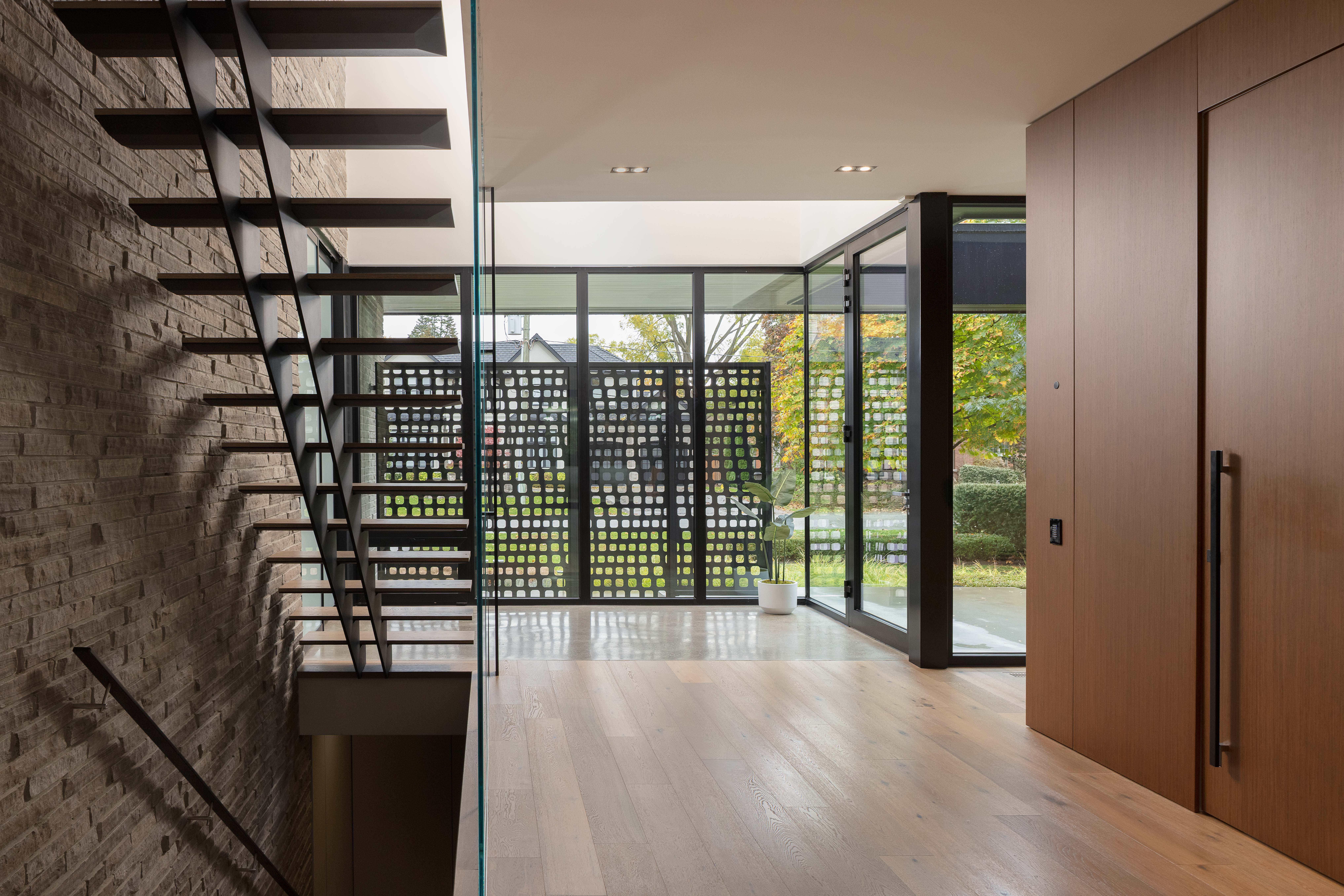 large front foyer. wide hallways and hard wood flooring