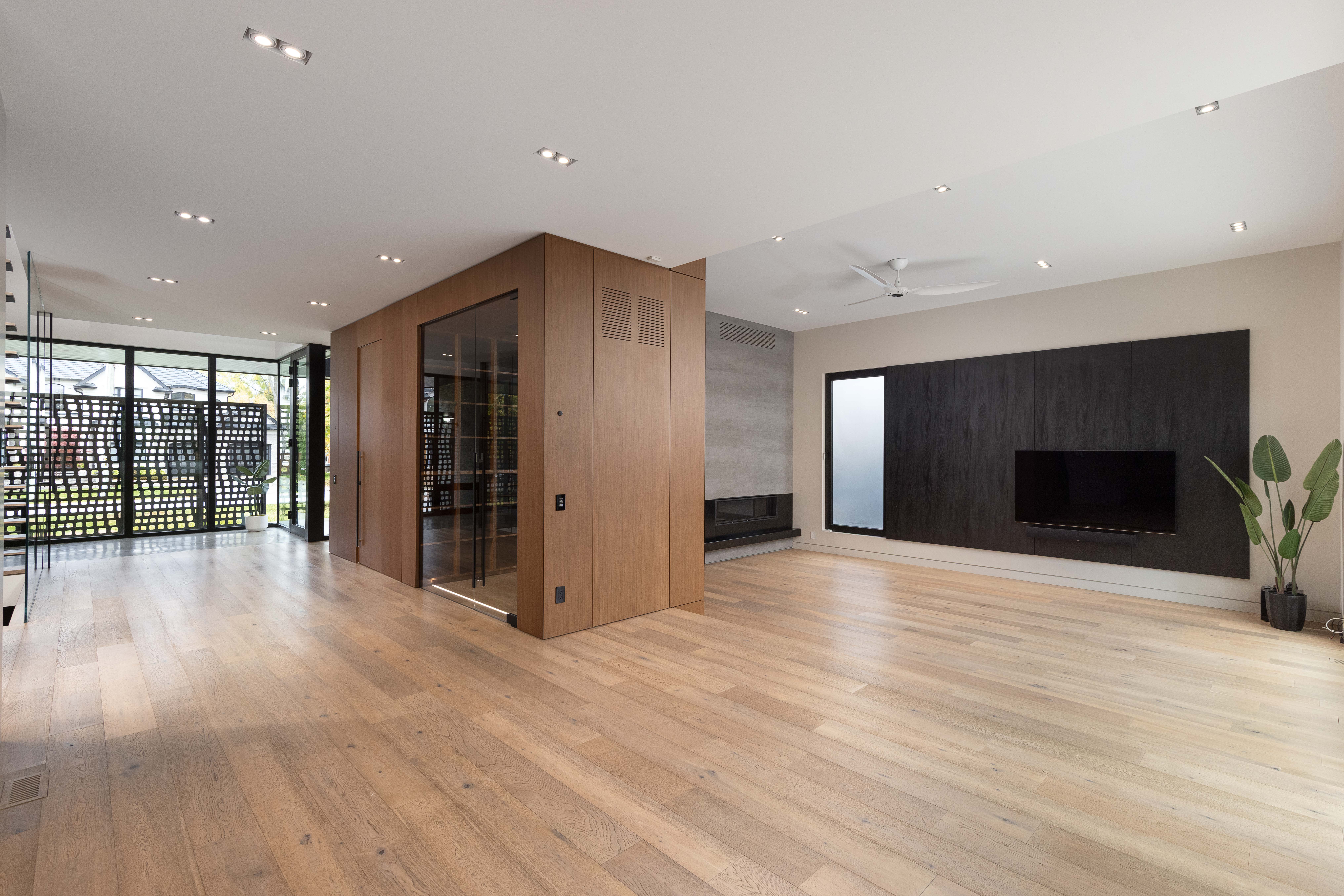 large open concept living room with built in gas fireplace