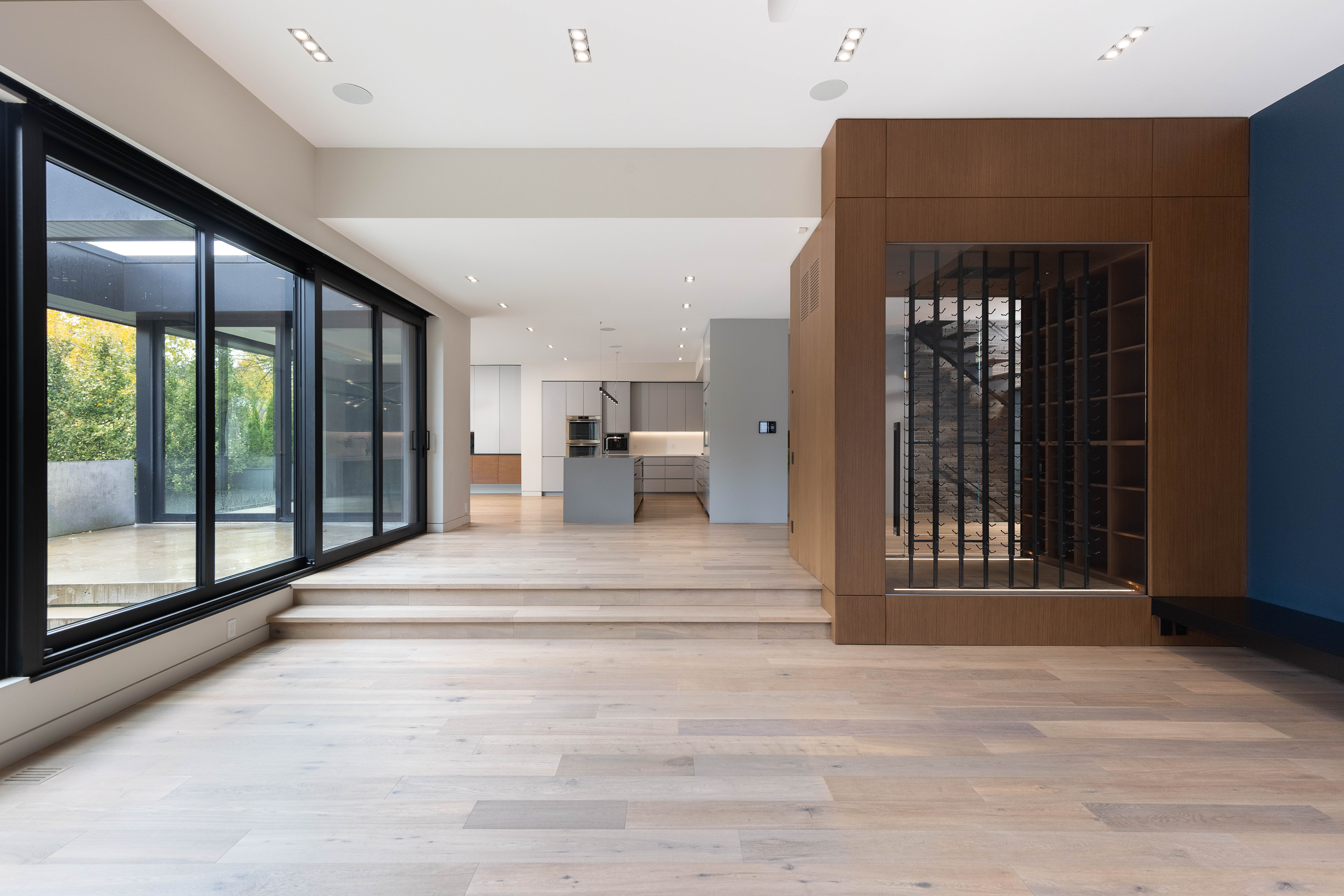 sunken living room with large windows