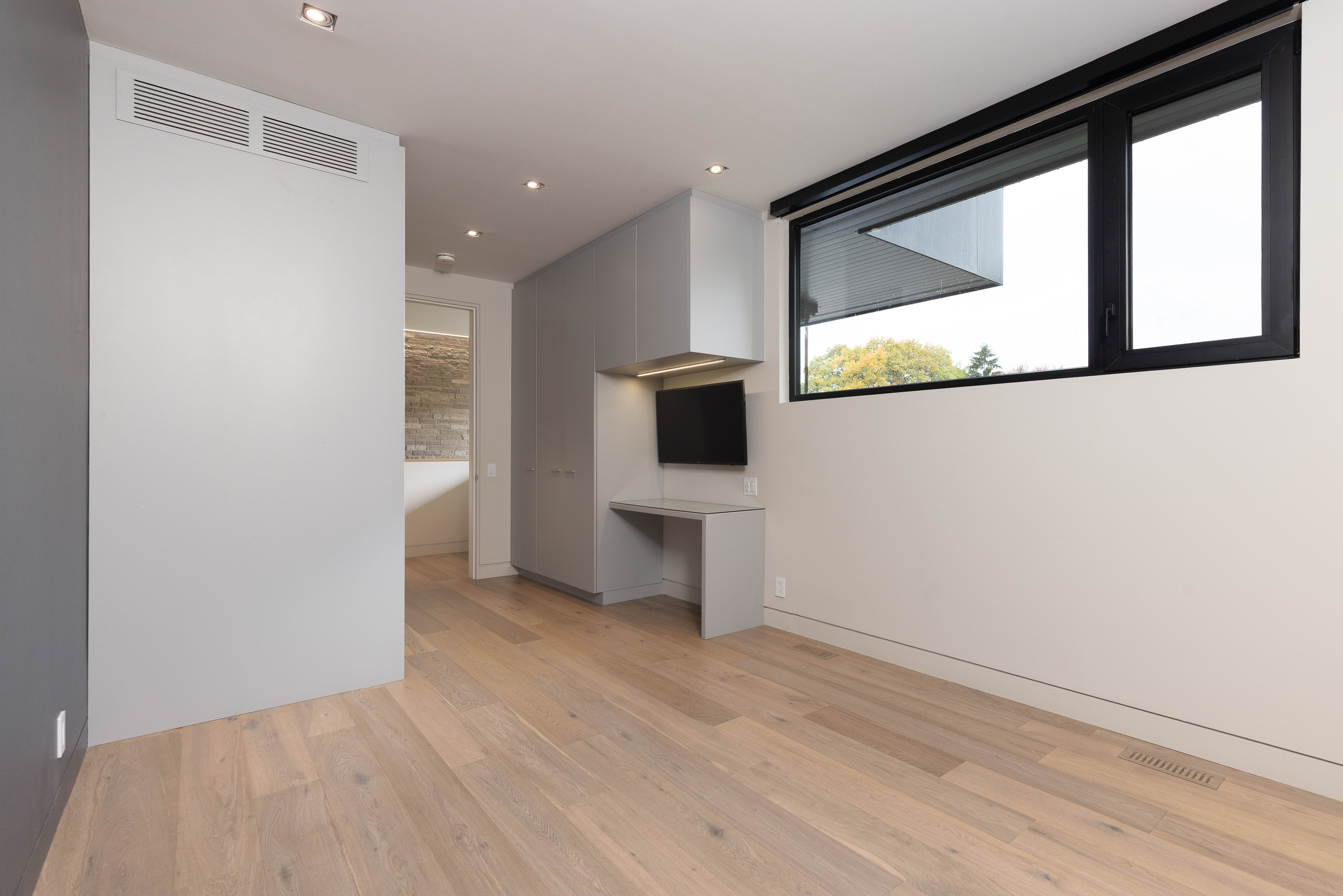 second bedroom with custom work desk