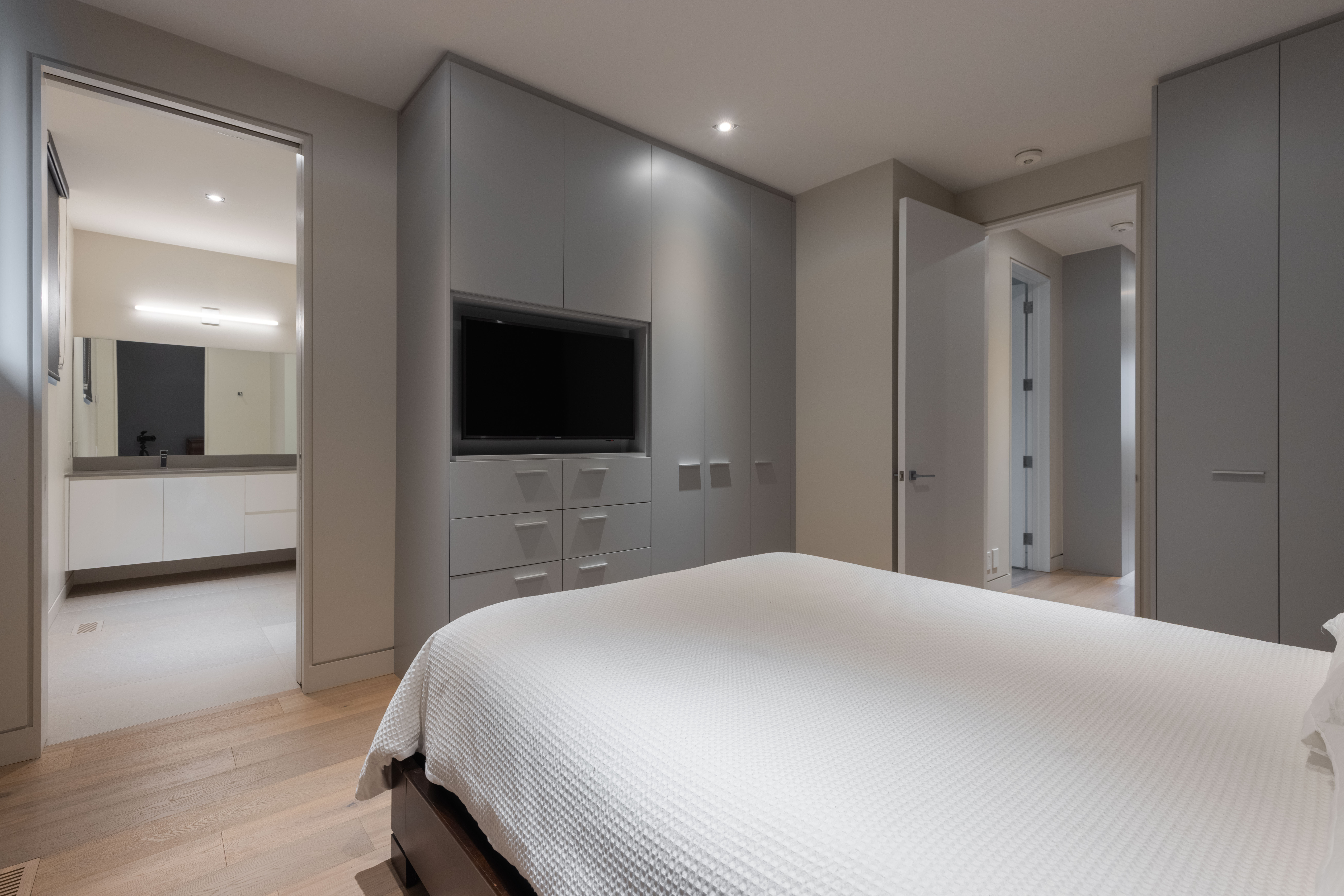 third bedroom with lots of cabinets.