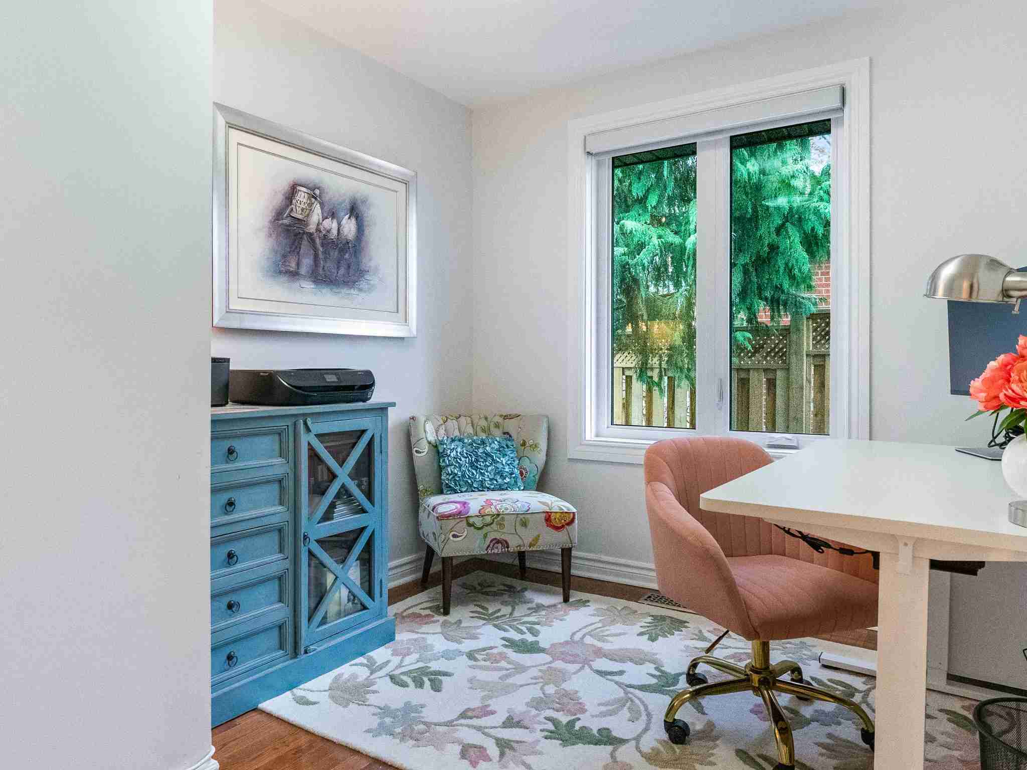 office with storage and window facing backyard