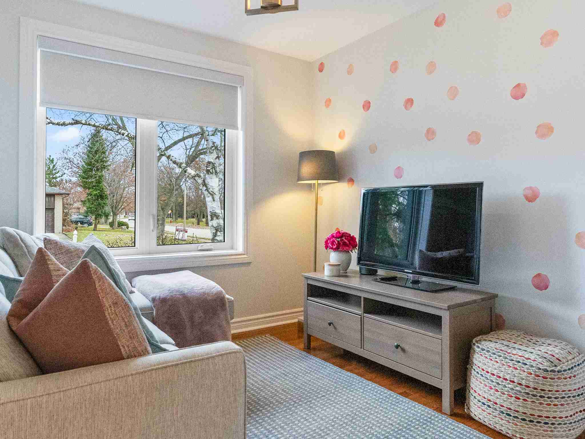 bedroom 3 being used as a recreation room with tv
