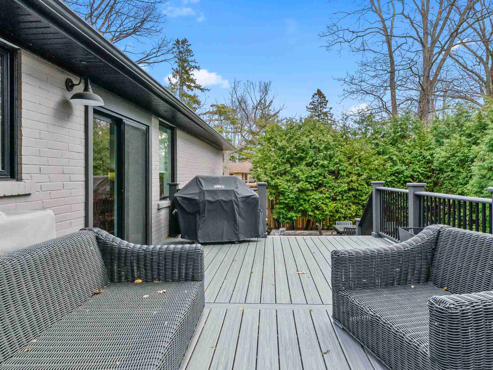 deck with sitting area and barbeque
