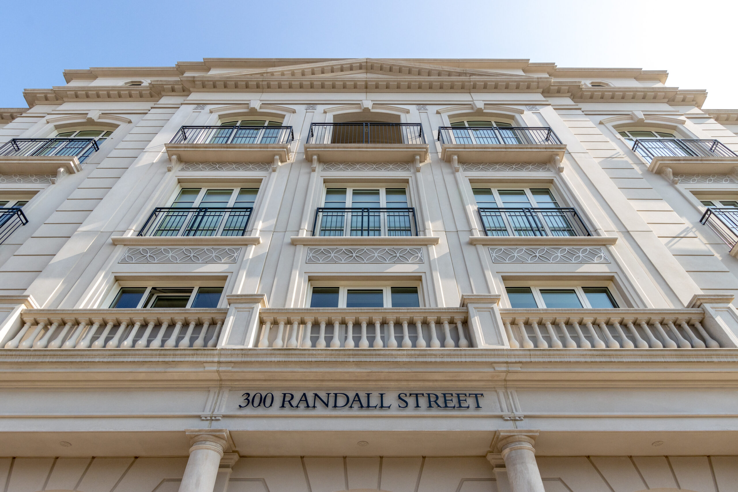 Facade of a building with balconies and "360 Randall Street" sign