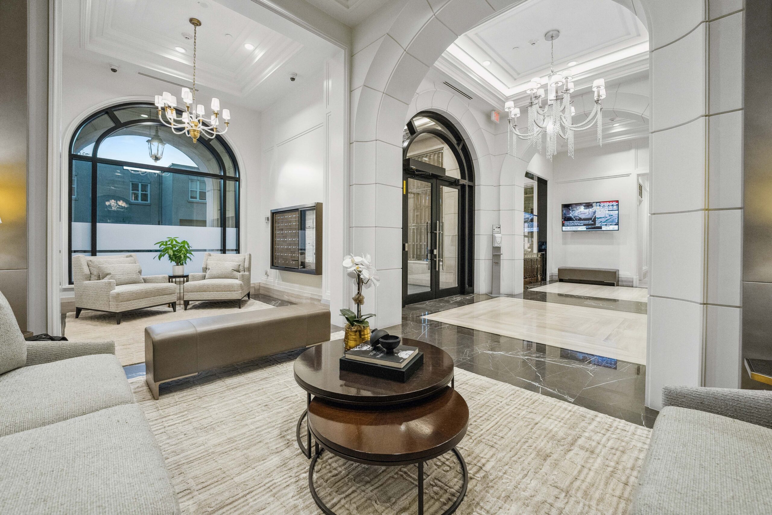 Modern lobby with elegant seating and decorative lighting