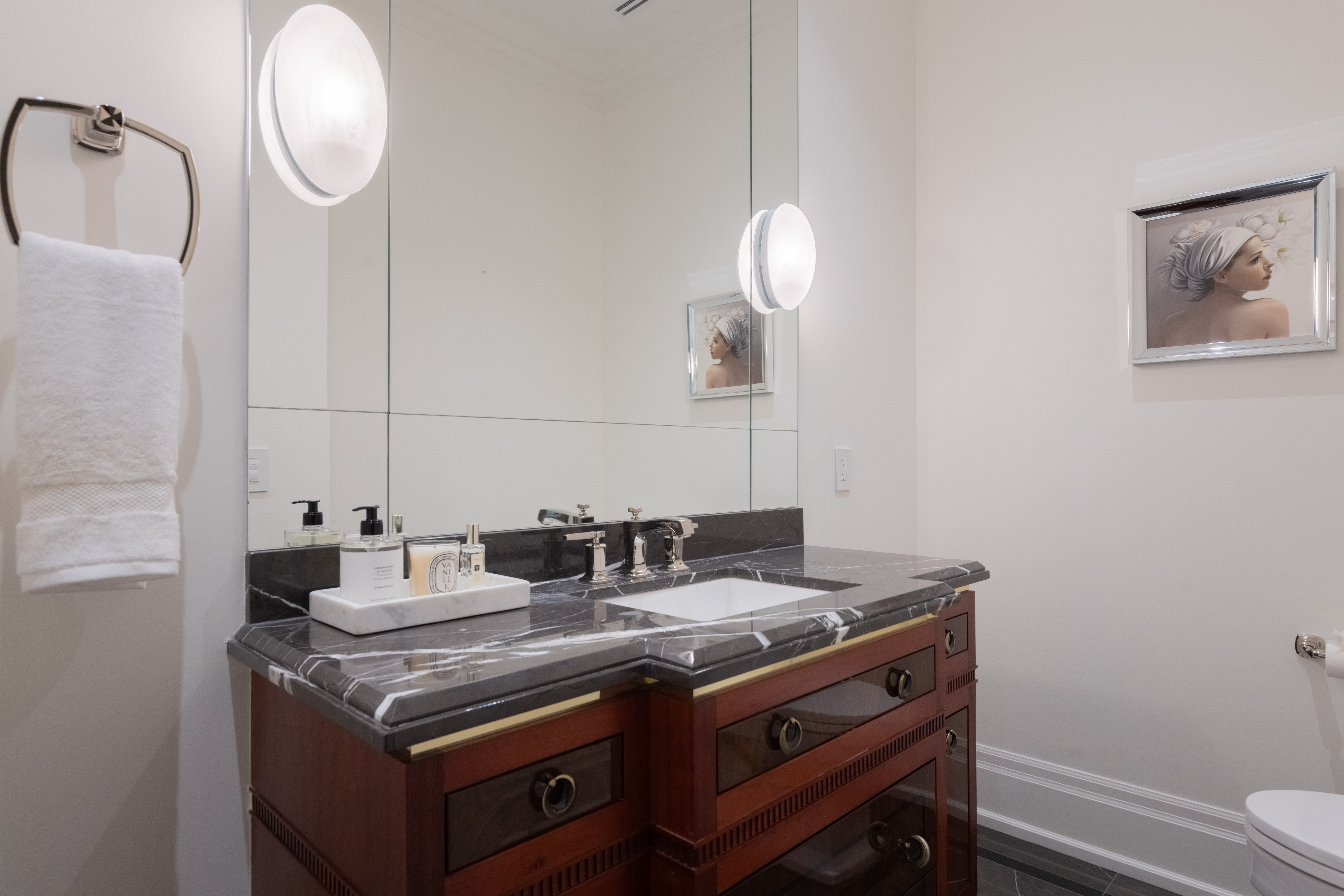 Modern bathroom with a double sink vanity and large mirror
