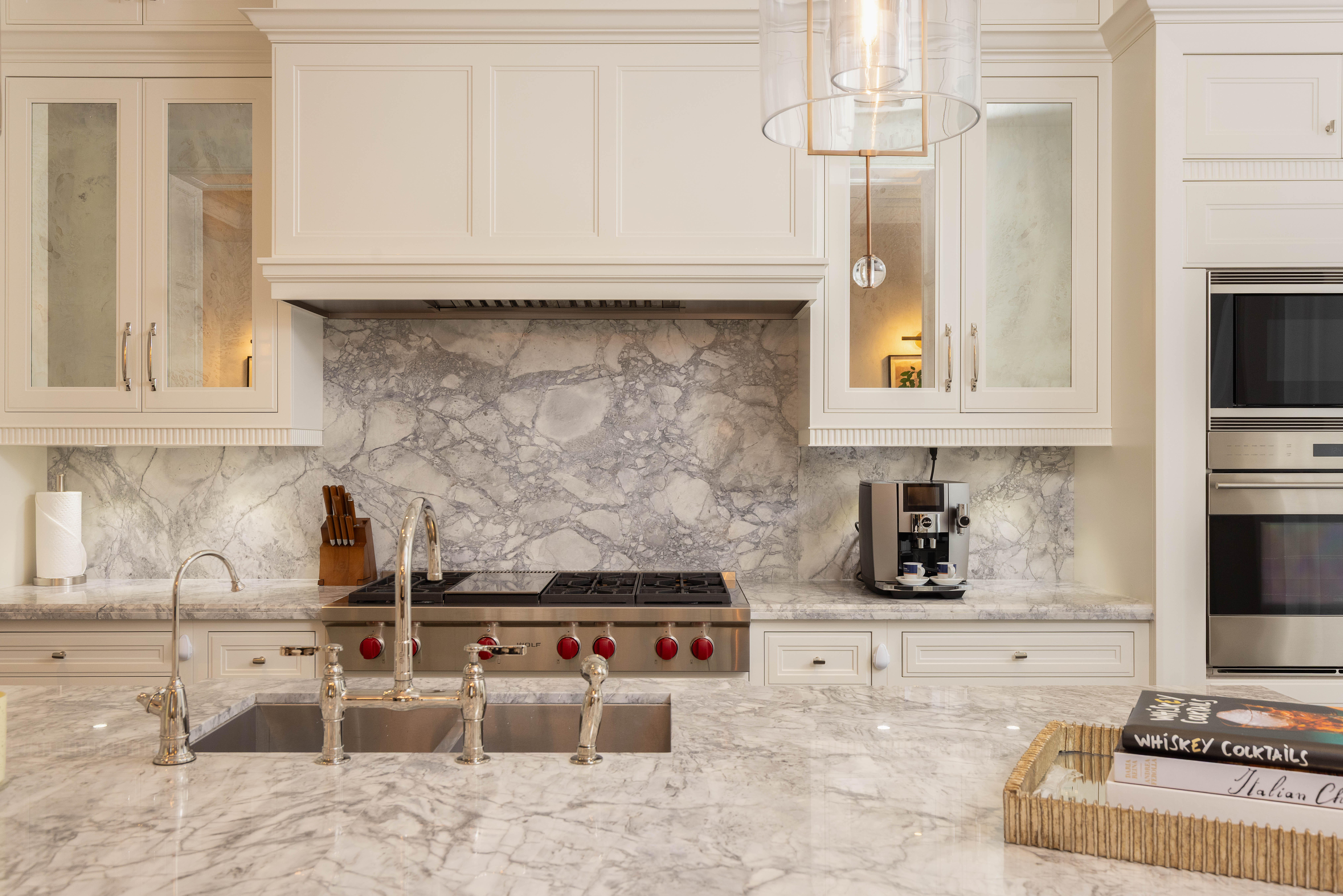 Modern kitchen with marble countertops and elegant cabinetry