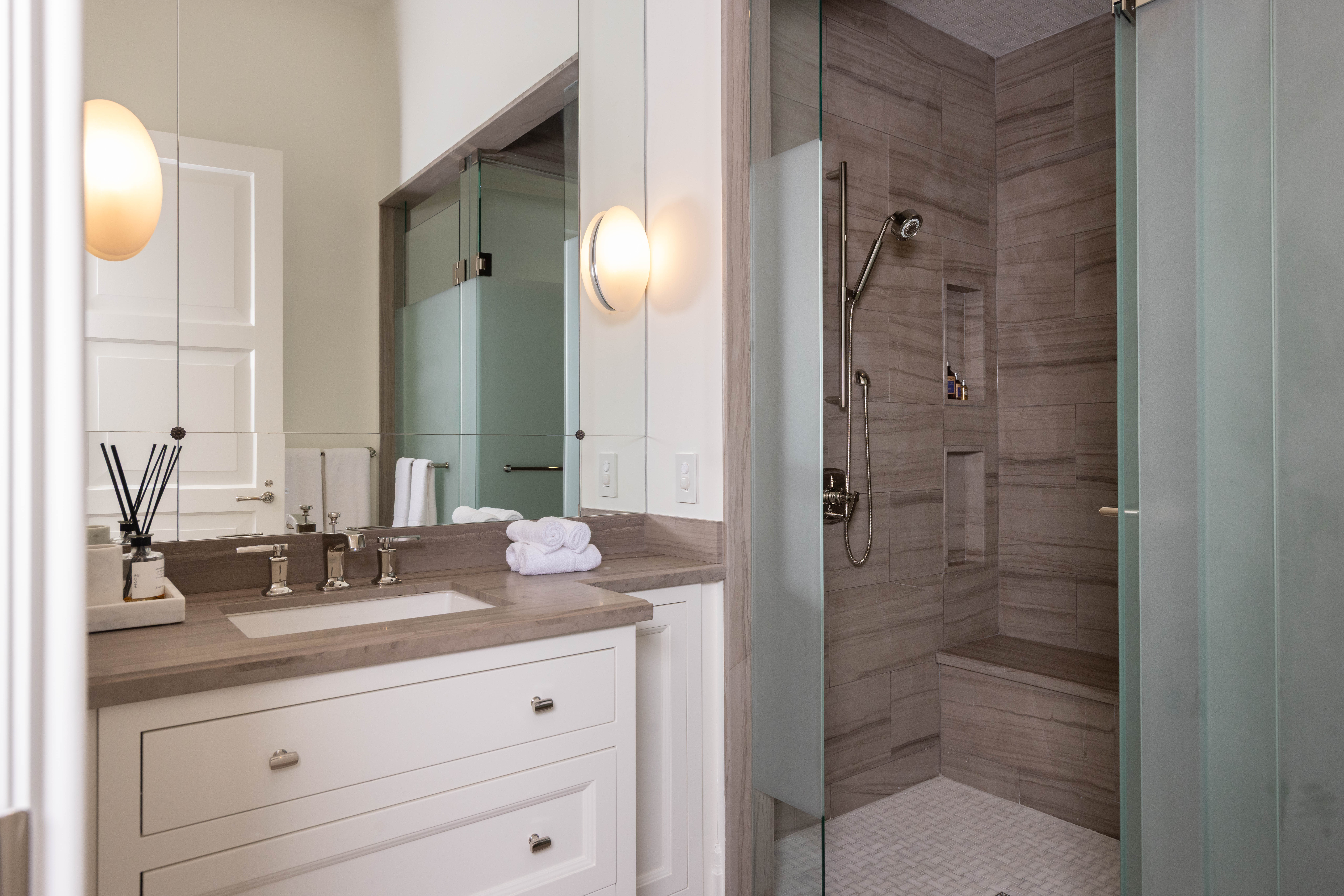 Modern bathroom with a glass shower and neutral tones