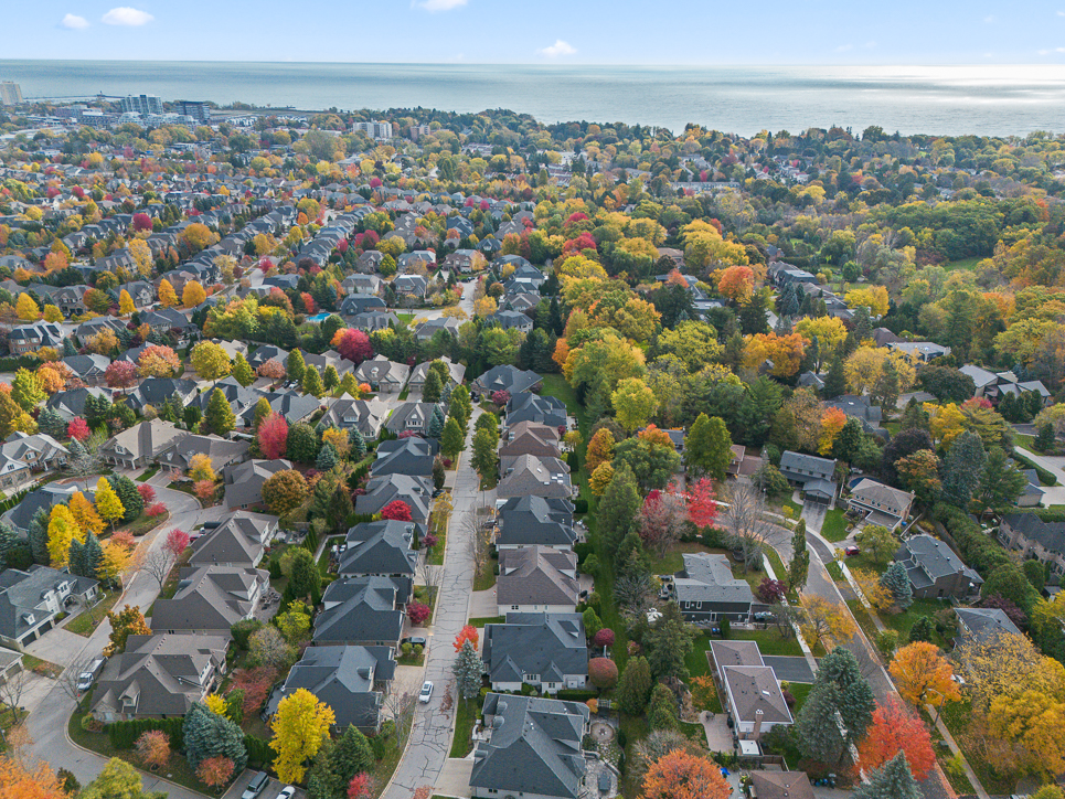 Aerial view of a colorful suburban neighborhood in autumn