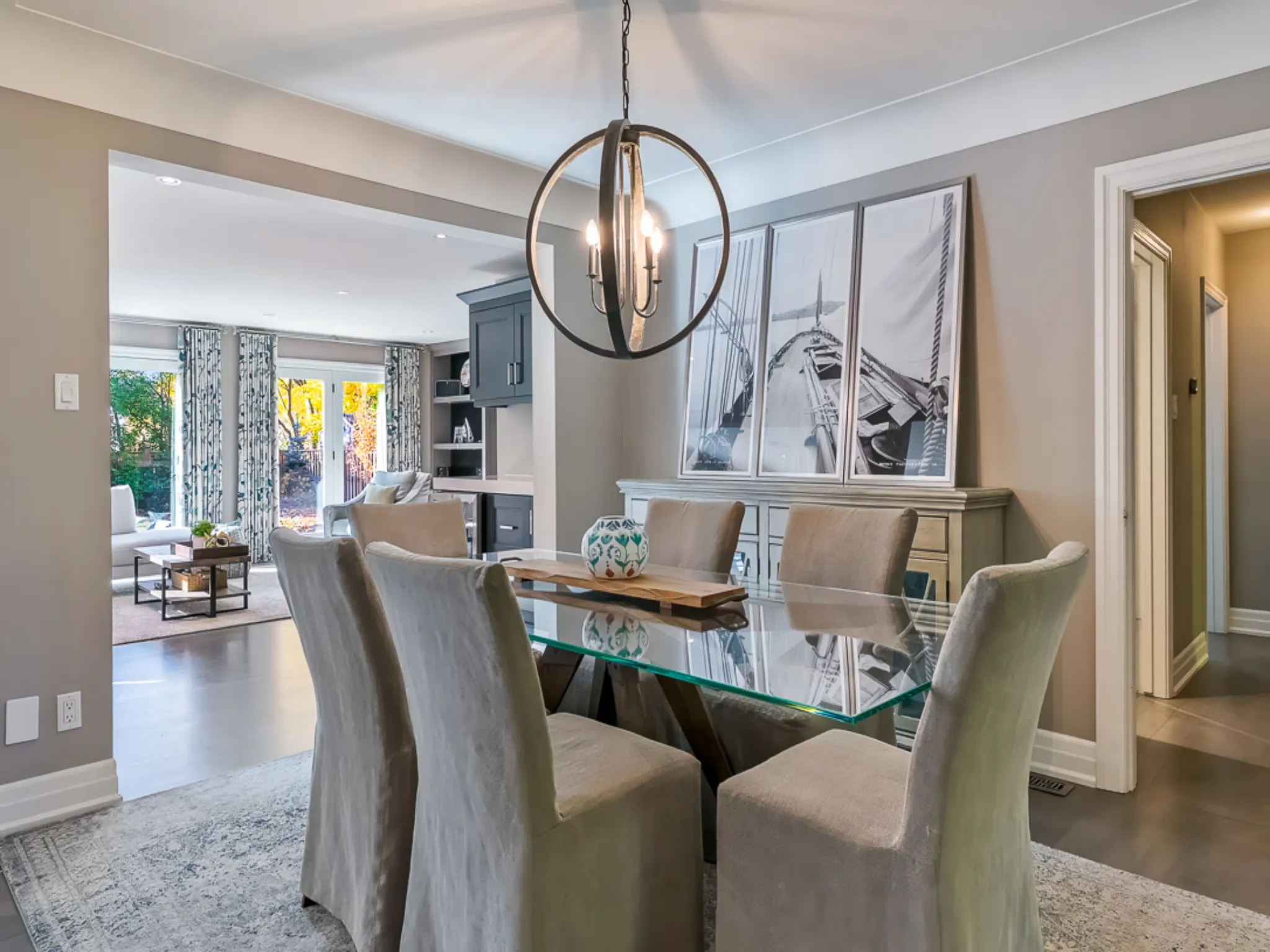 Modern dining room with a glass table and stylish chairs