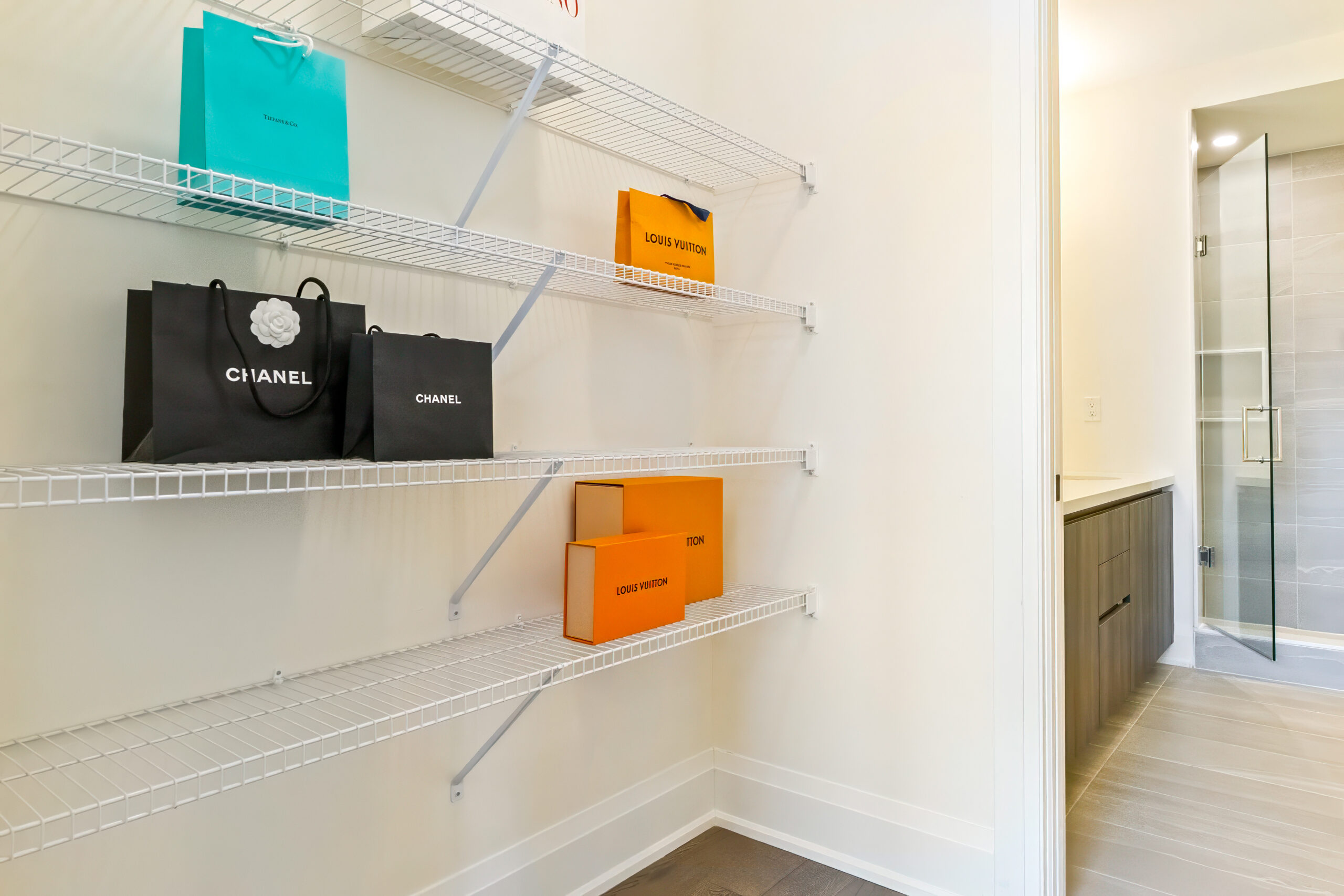Shelving with colorful bags and boxes in a modern interior space