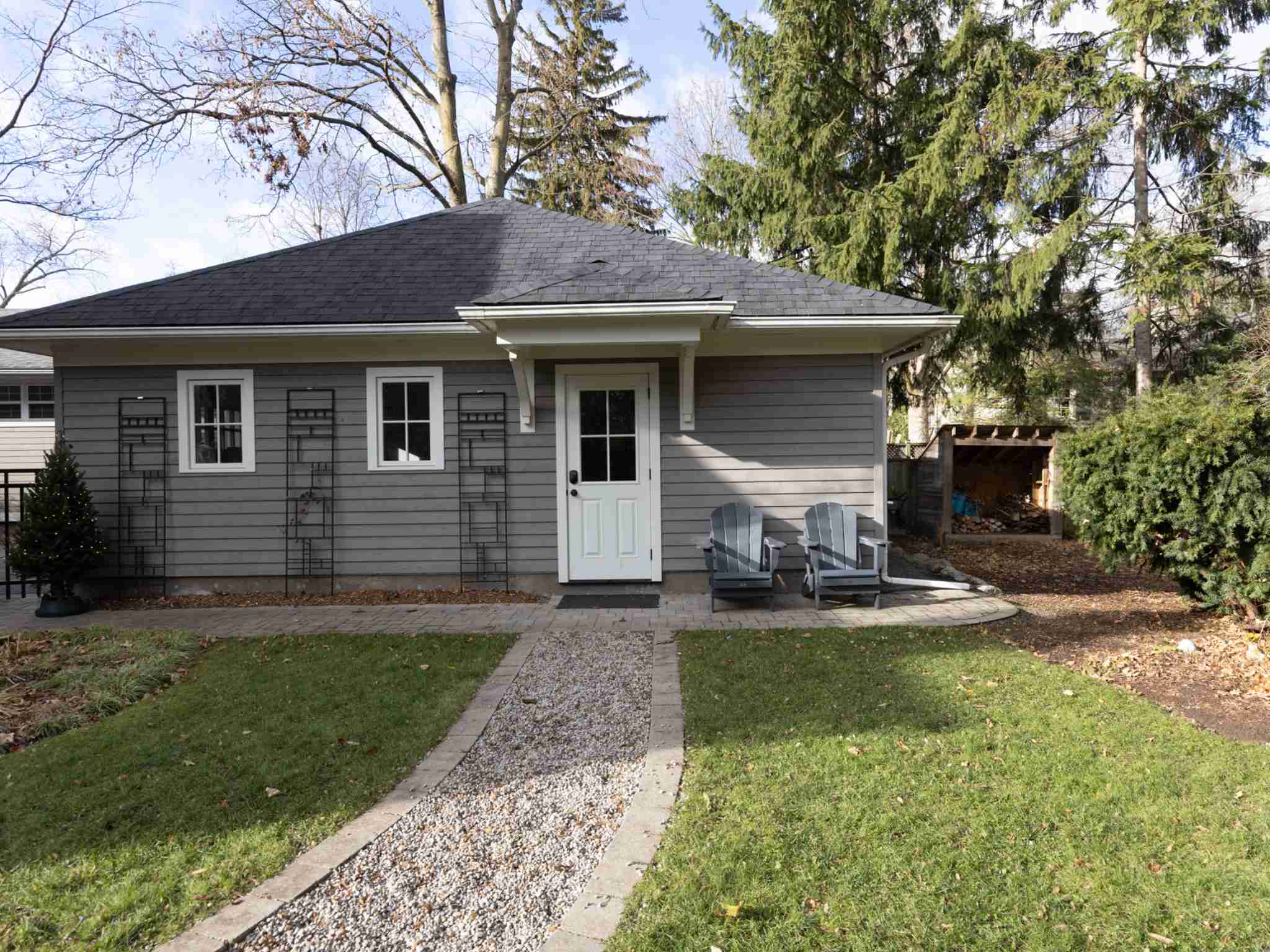 walk way leading to side door to garage