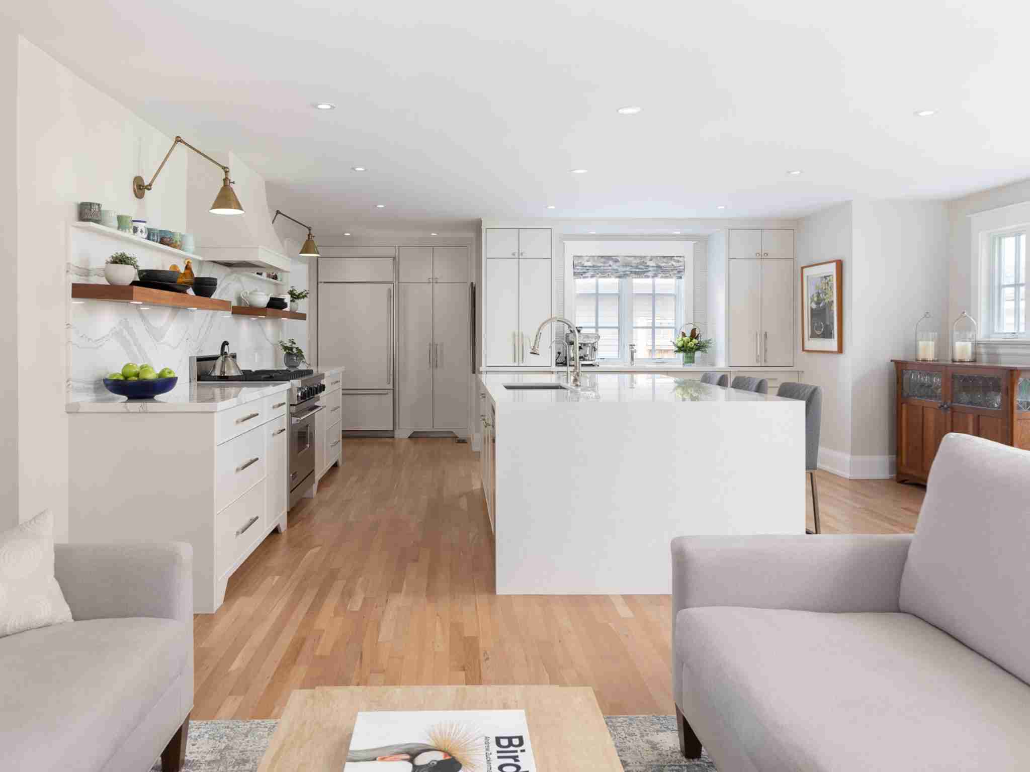 Large waterfall counter top off the island. open concert kitchen