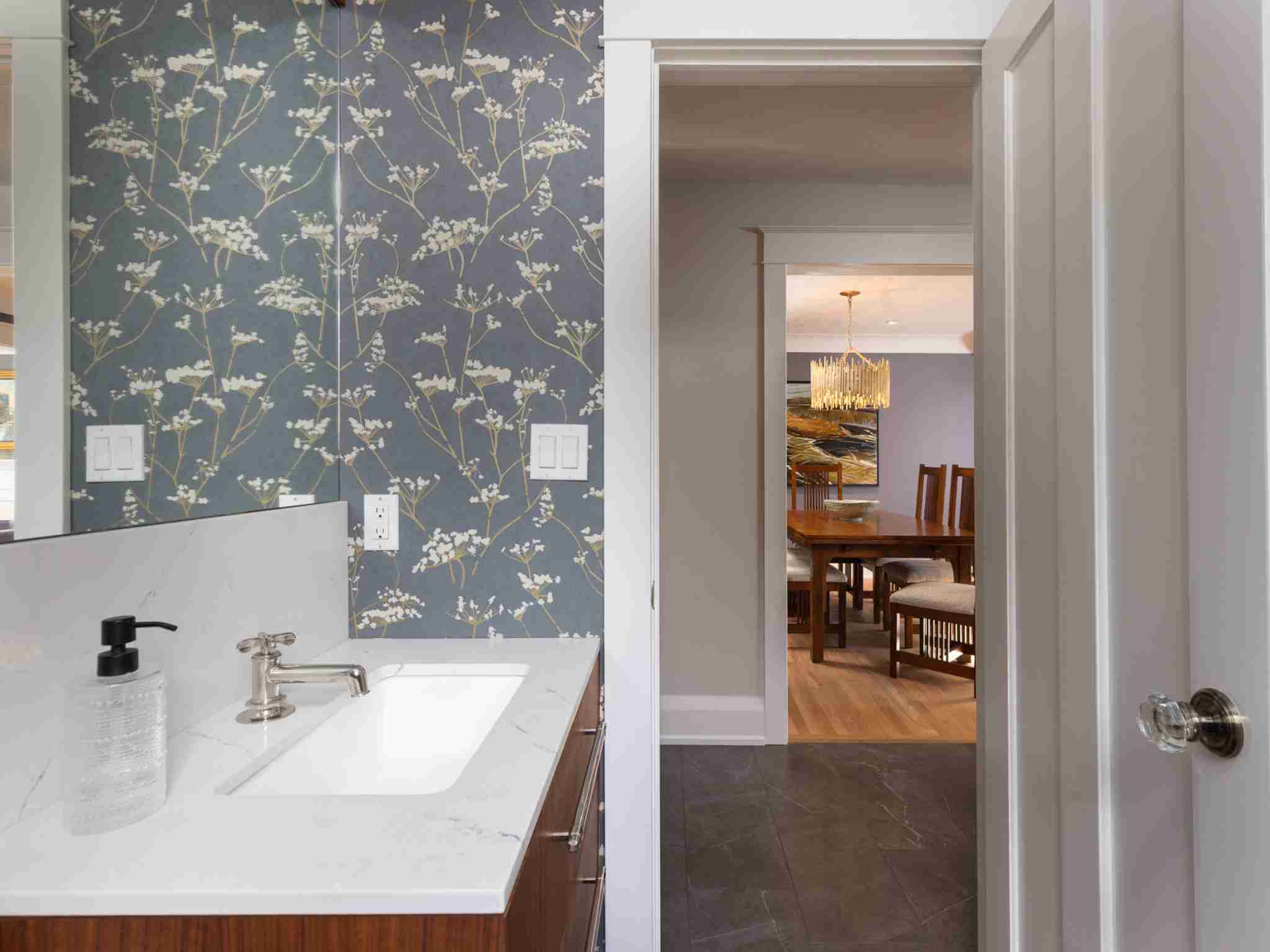 main floor powder room with custom wall paper