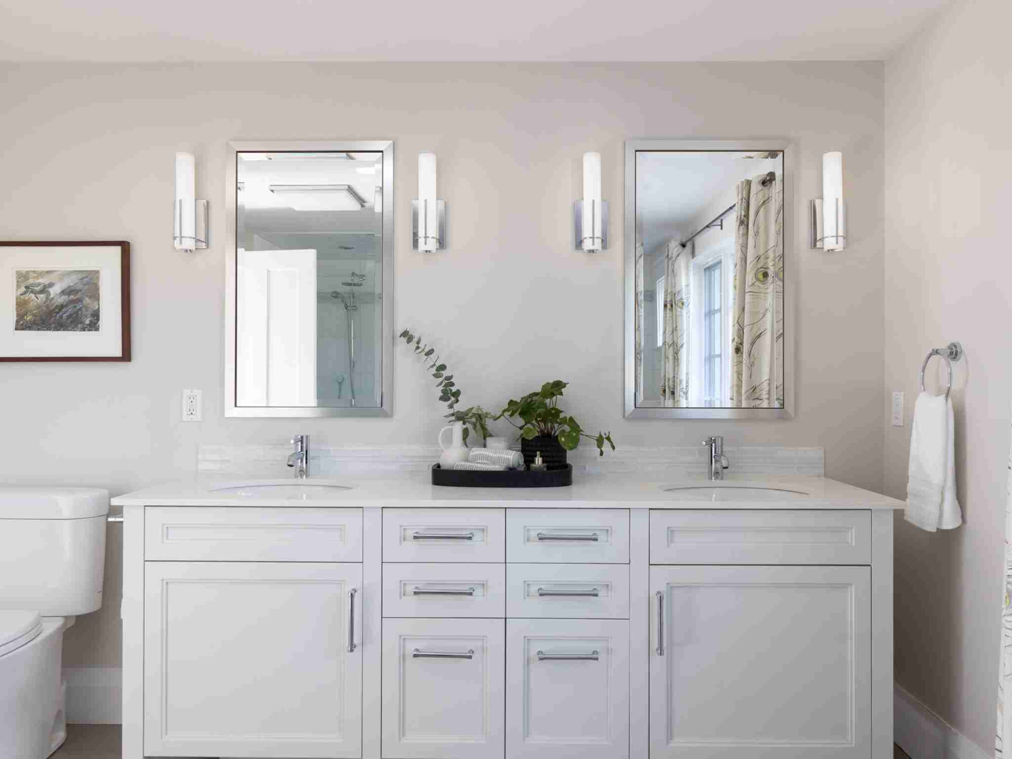 modern double vanity with sconces lighting