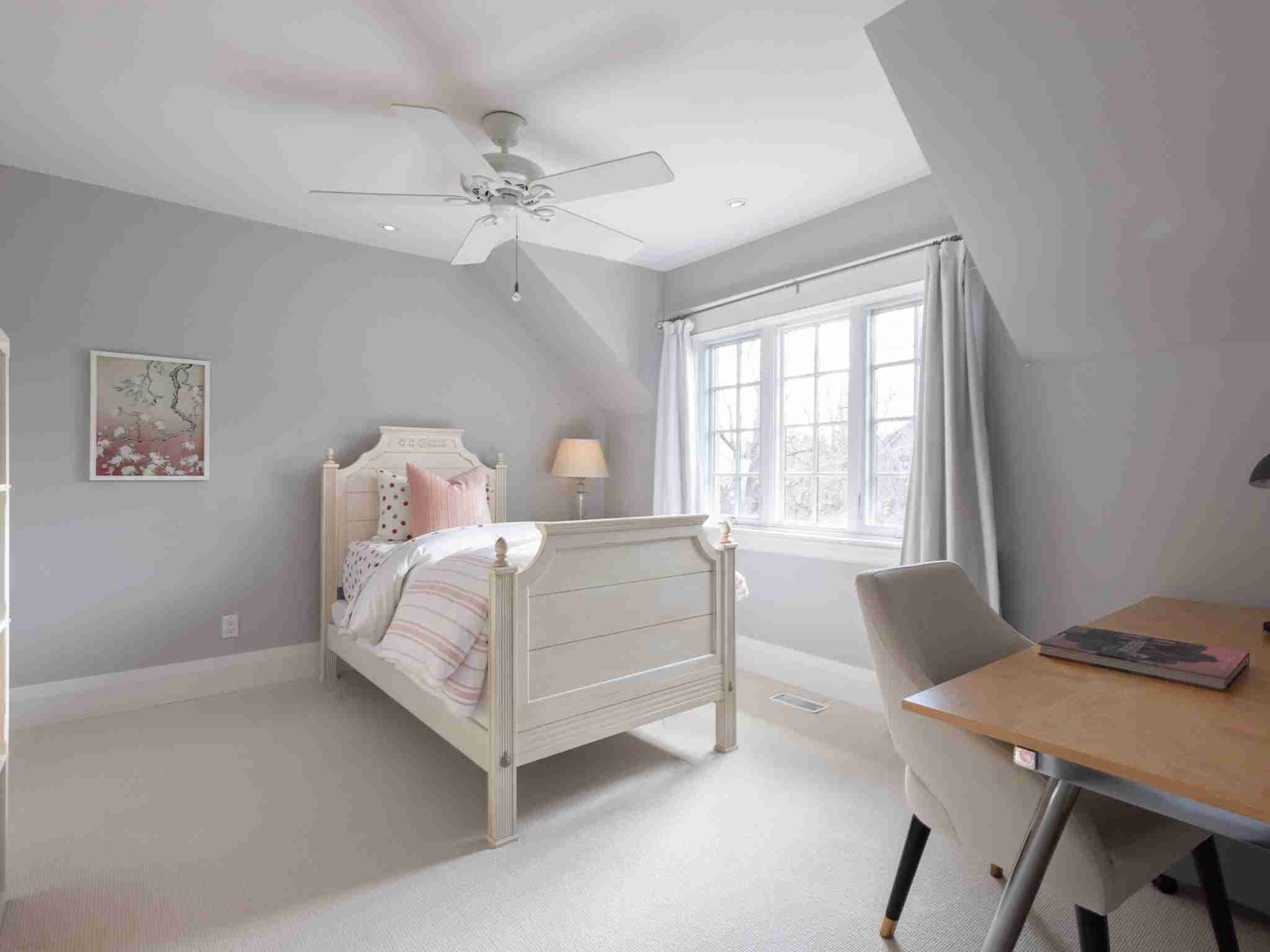 Bedroom 3 with carpet and window beside bed